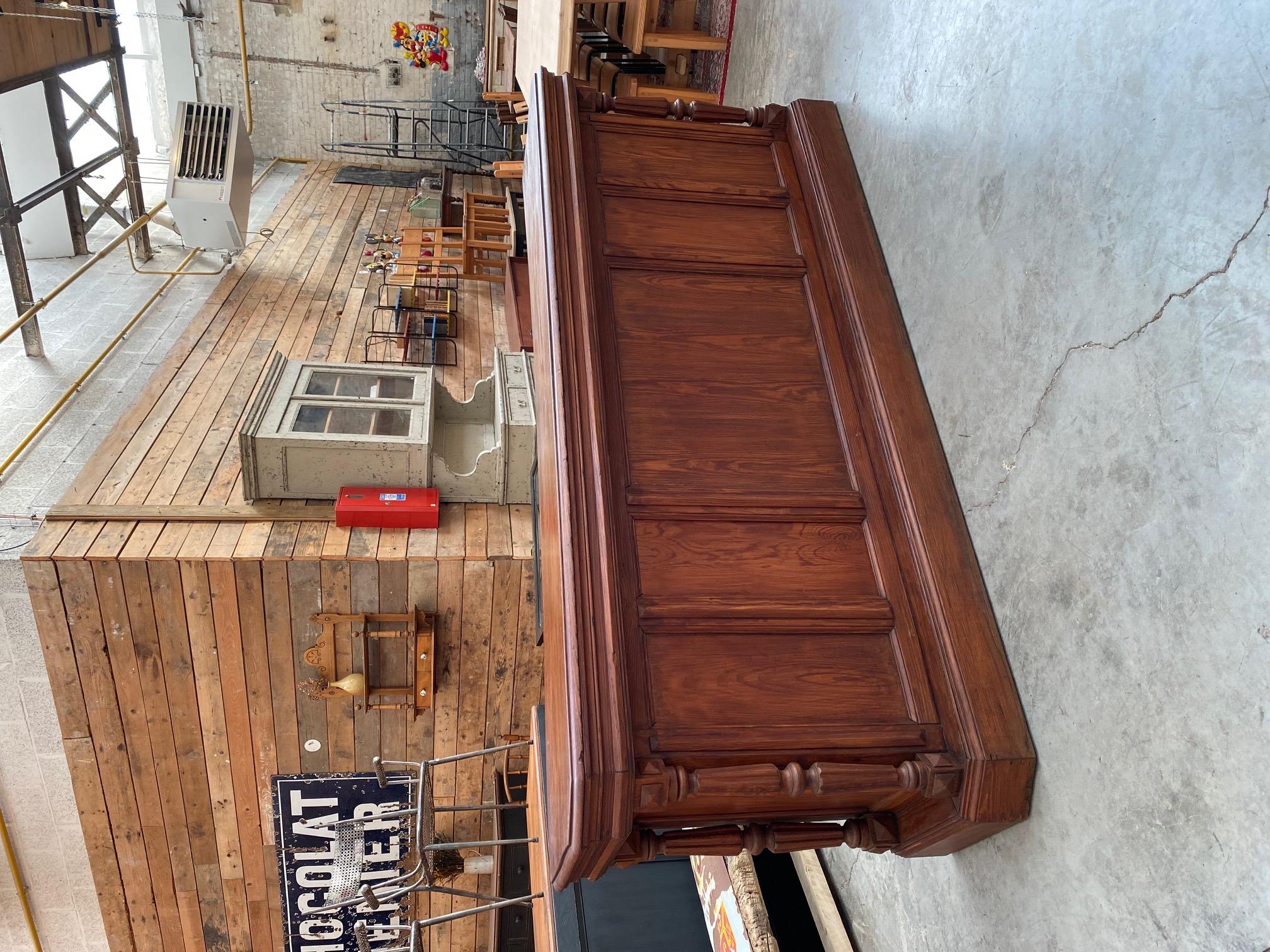 This counter has been completely restored.

It has a large storage shelf on the back.