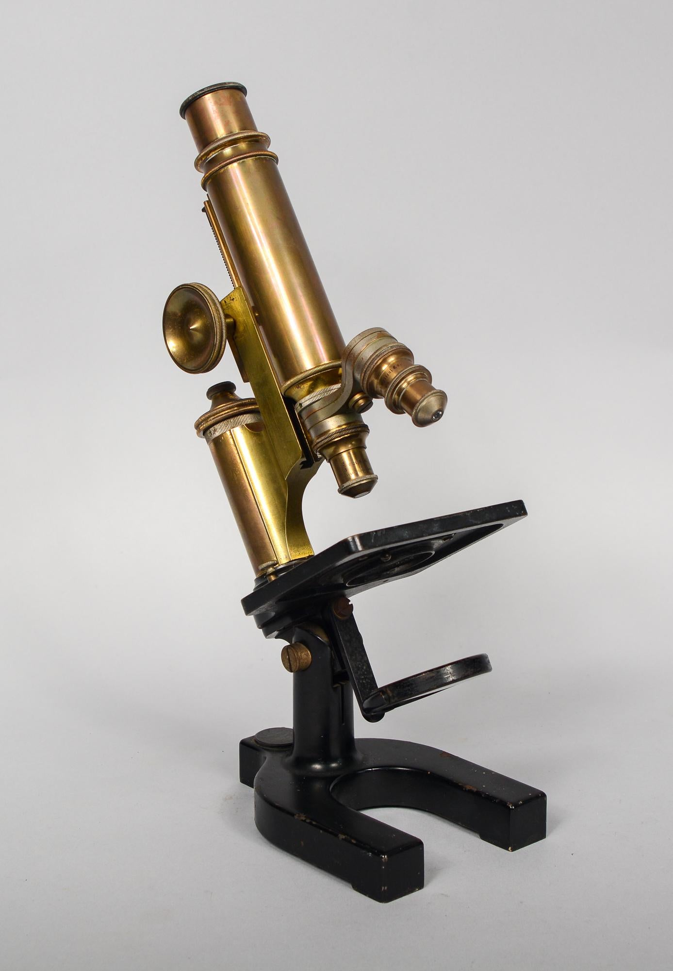 Brass and iron Bausch and Lomb microscope. This has a patent date of February 16, 1897. This microscope has two objectives. This is from an older collection belonging to a doctor. We do not know the functionality of this. The fine tuning is a little