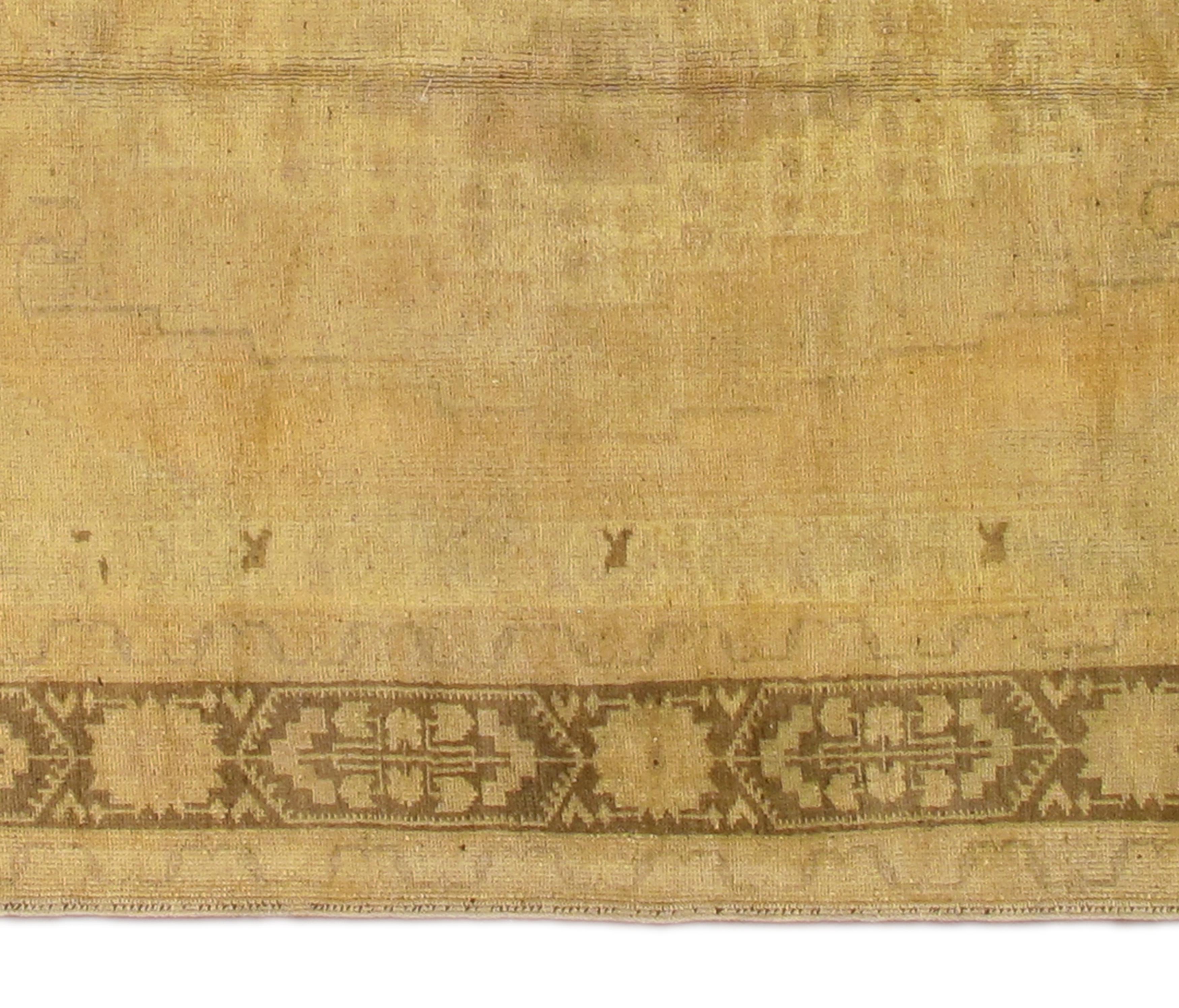 Early 20th Century Beige, Tan Turkish Khotan Carpet In Excellent Condition For Sale In Norwalk, CT