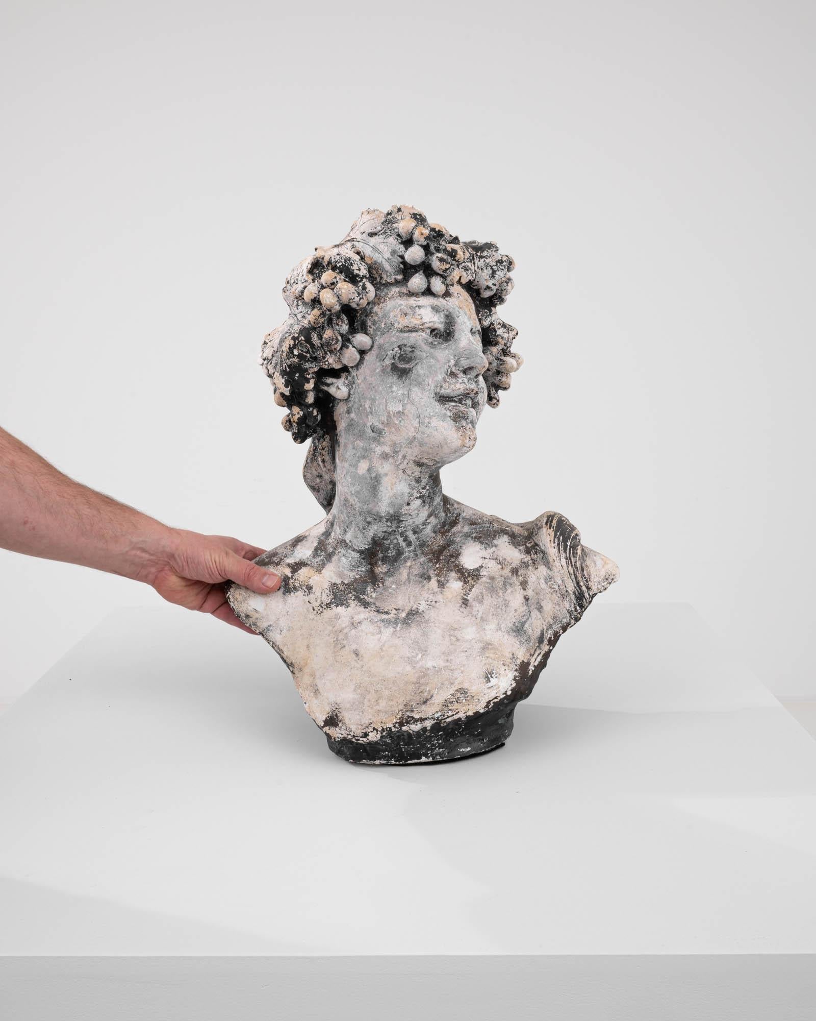 Discover the enchanting beauty of our Early 20th Century Belgian Plaster Sculpture by renowned artist Jef Lambeaux. This captivating masterpiece portrays a young woman with flowing locks, exuding timeless elegance and grace. Crafted with exquisite