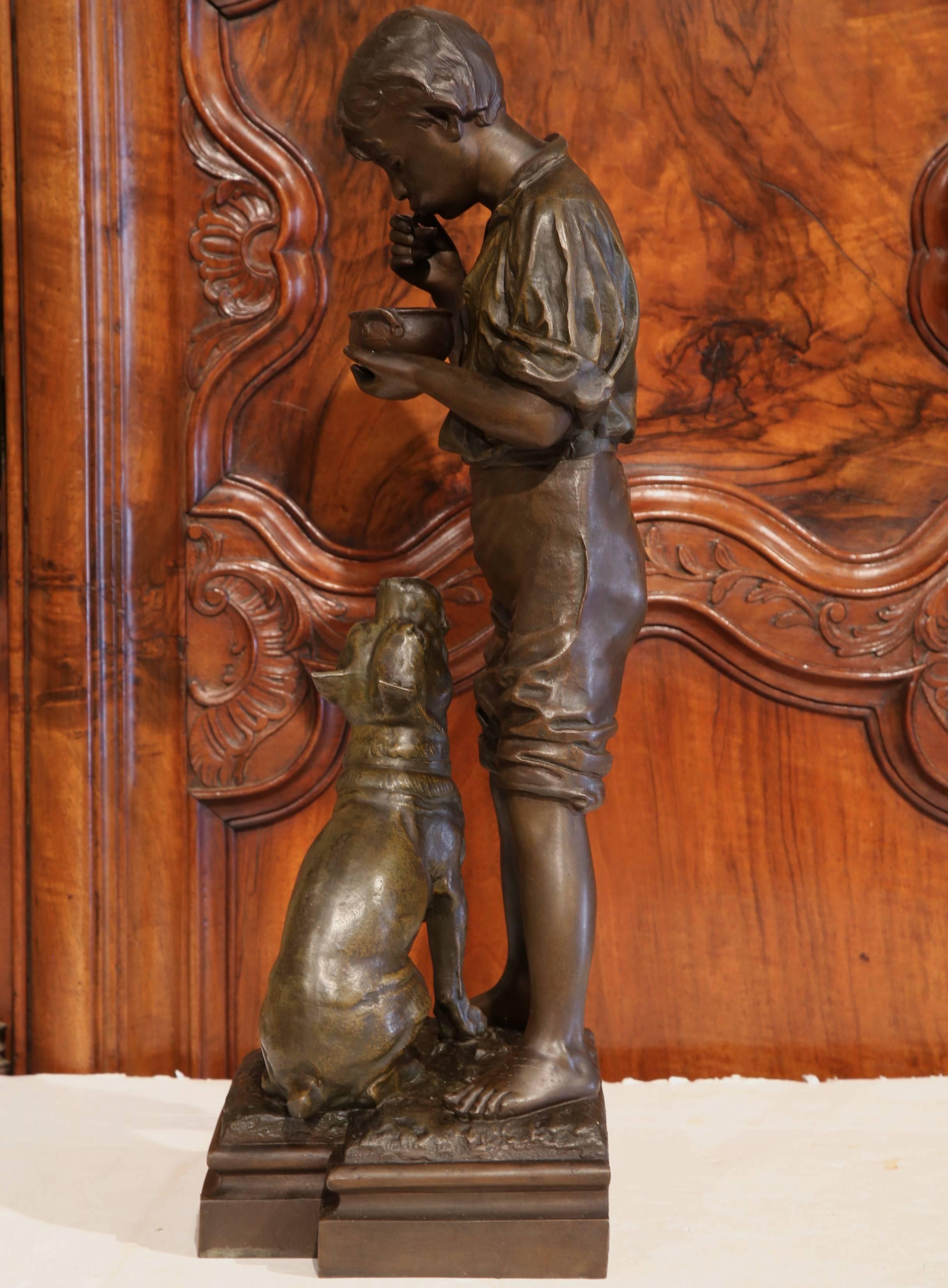 Patinated Early 20th Century Belgium Spelter Boy and Dog Sculpture Signed V. Rousseau 1932