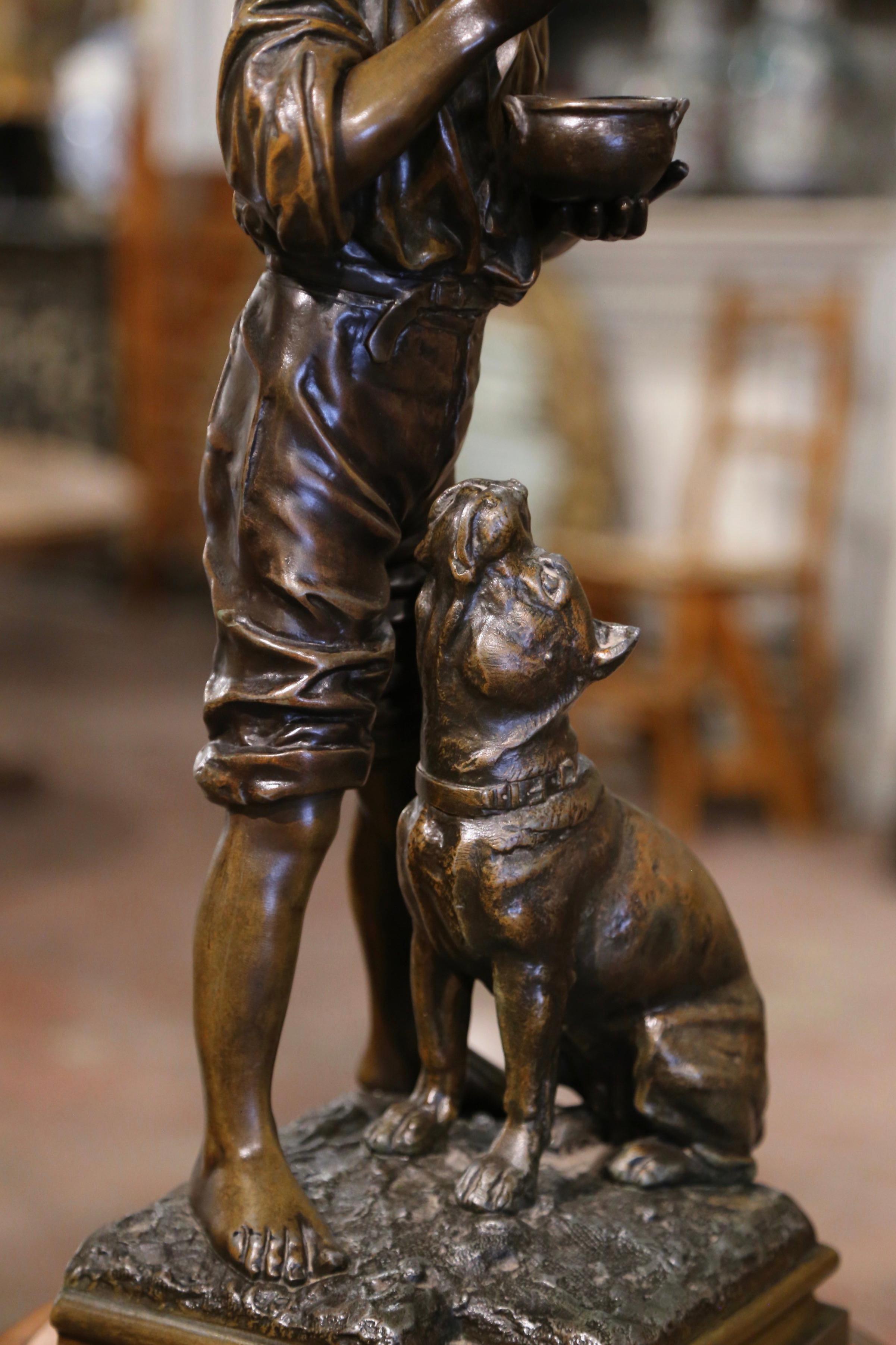 20ième siècle Sculpture belge du début du 20e siècle en Spelter Boy and Dog signée V. Rousseau  en vente