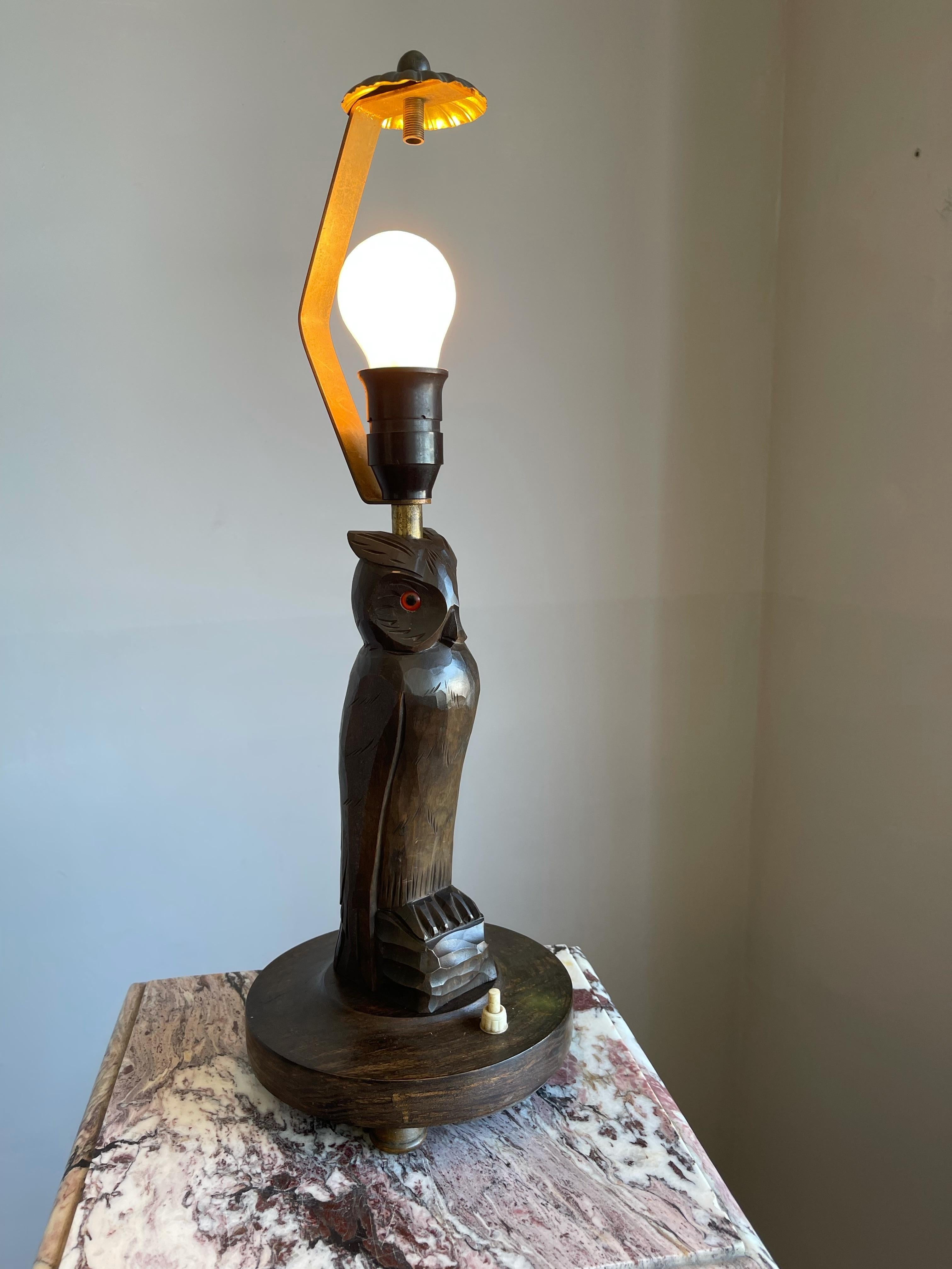 Early twentieth century, beautifully hand-carved standing owl.
 
With this rare owl lamp you can create a very nice atmosphere on your desk or on a table in a corner of a room. This fine example dates from around the Art Deco era and that is exactly
