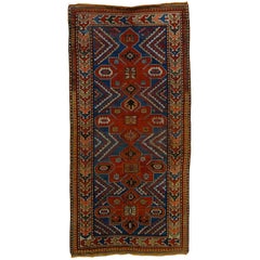 Antique Early 20th Century Blu and Red Natural Wool Caucasian Medallion Kazak Rug