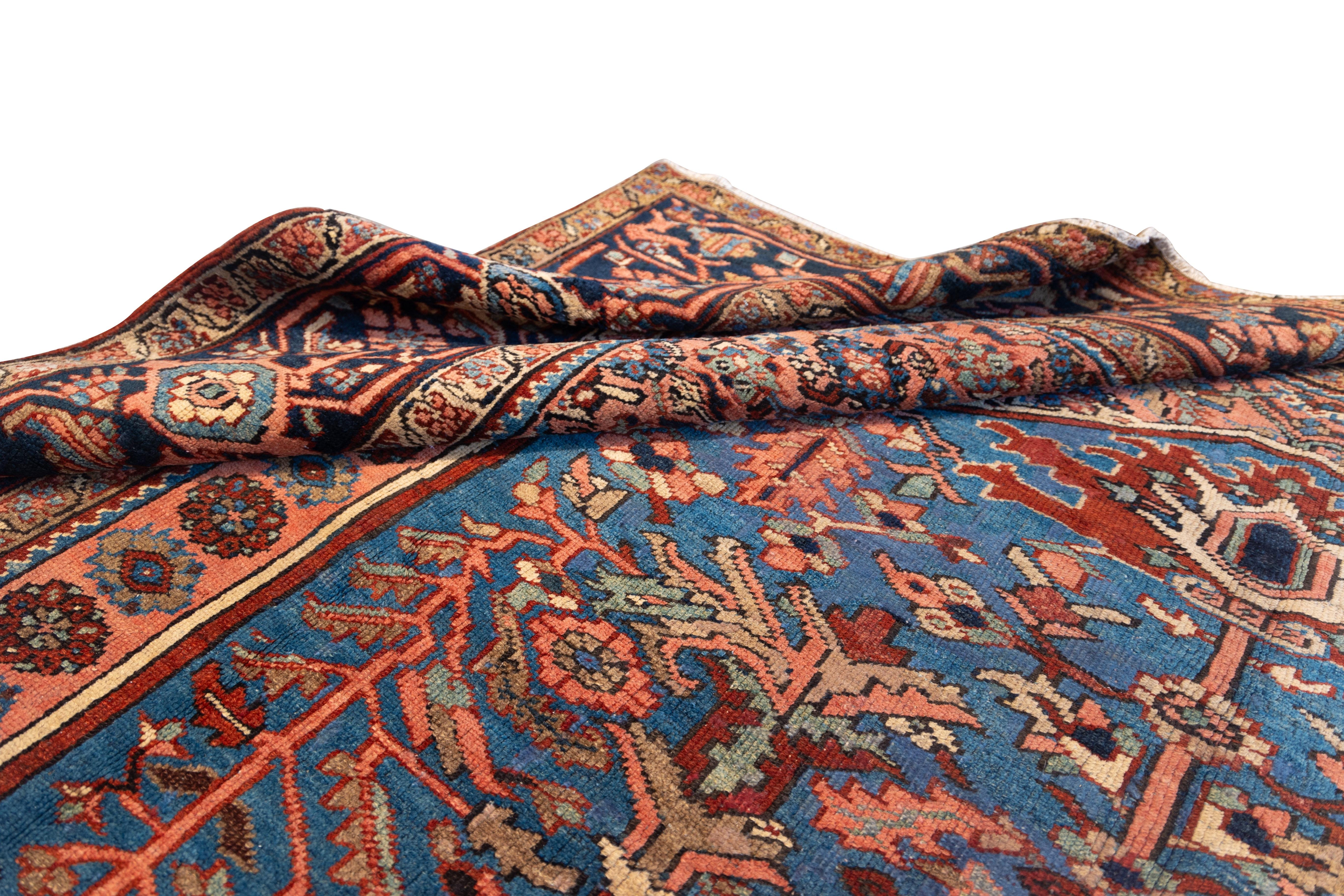 Wool Early 20th century blue Heriz tribal rug For Sale