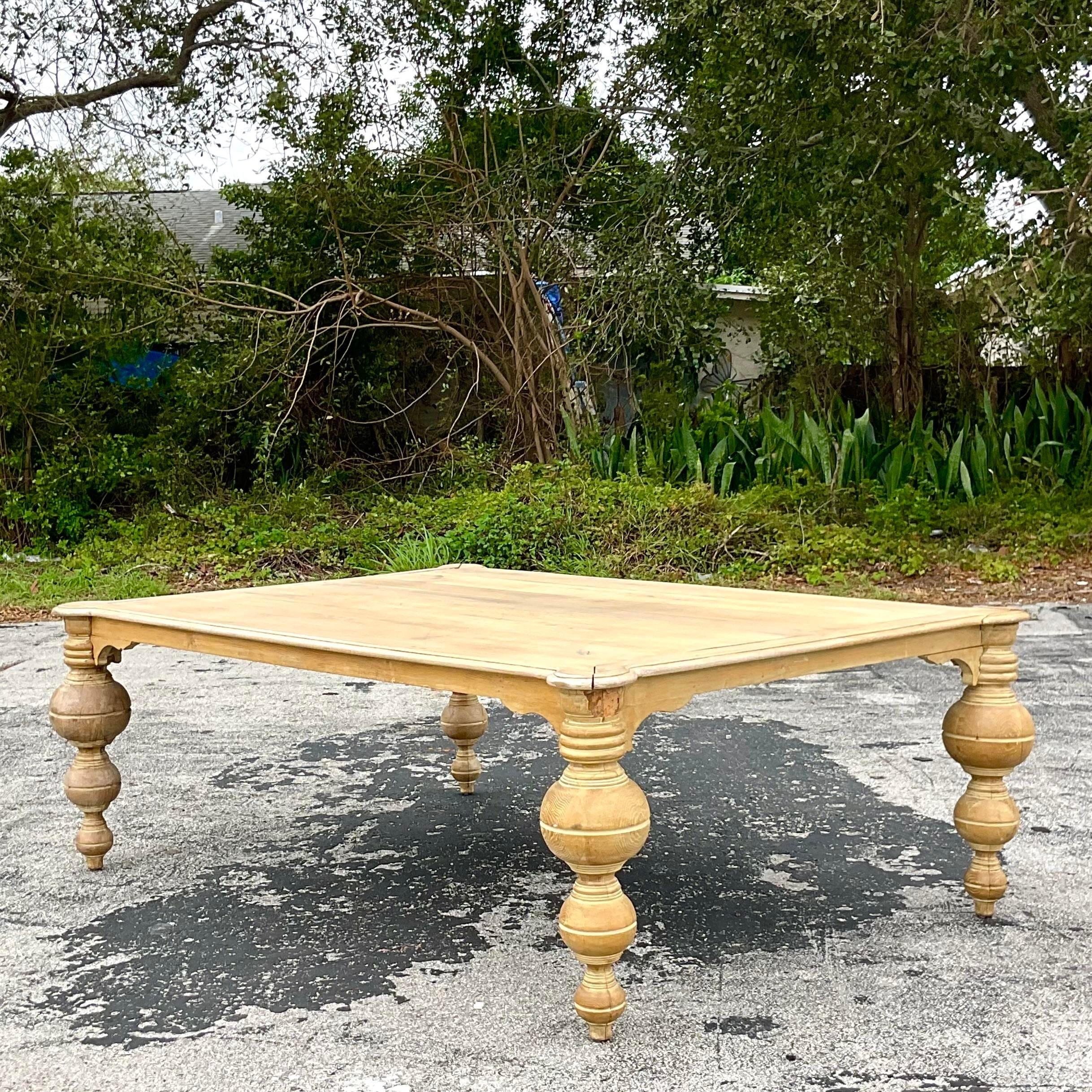 An exceptional vintage Boho farm table. Gorgeous turned leg detail with a beautiful washed finish. Monumental in size and drama. Acquired from the collection of the iconic Lars Bolander.