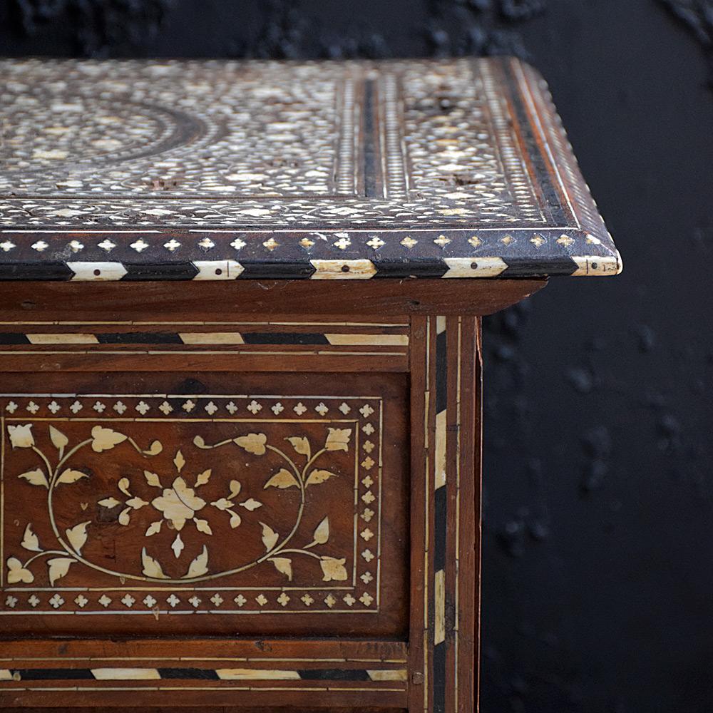 Early 20th Century bone inlay rosewood and ebony carved Syrian folding table 
We are proud to offer an unusually oversized square early 20th Century bone inlay carved rosewood and ebony Syrian folding occasional table. Aged naturally this example