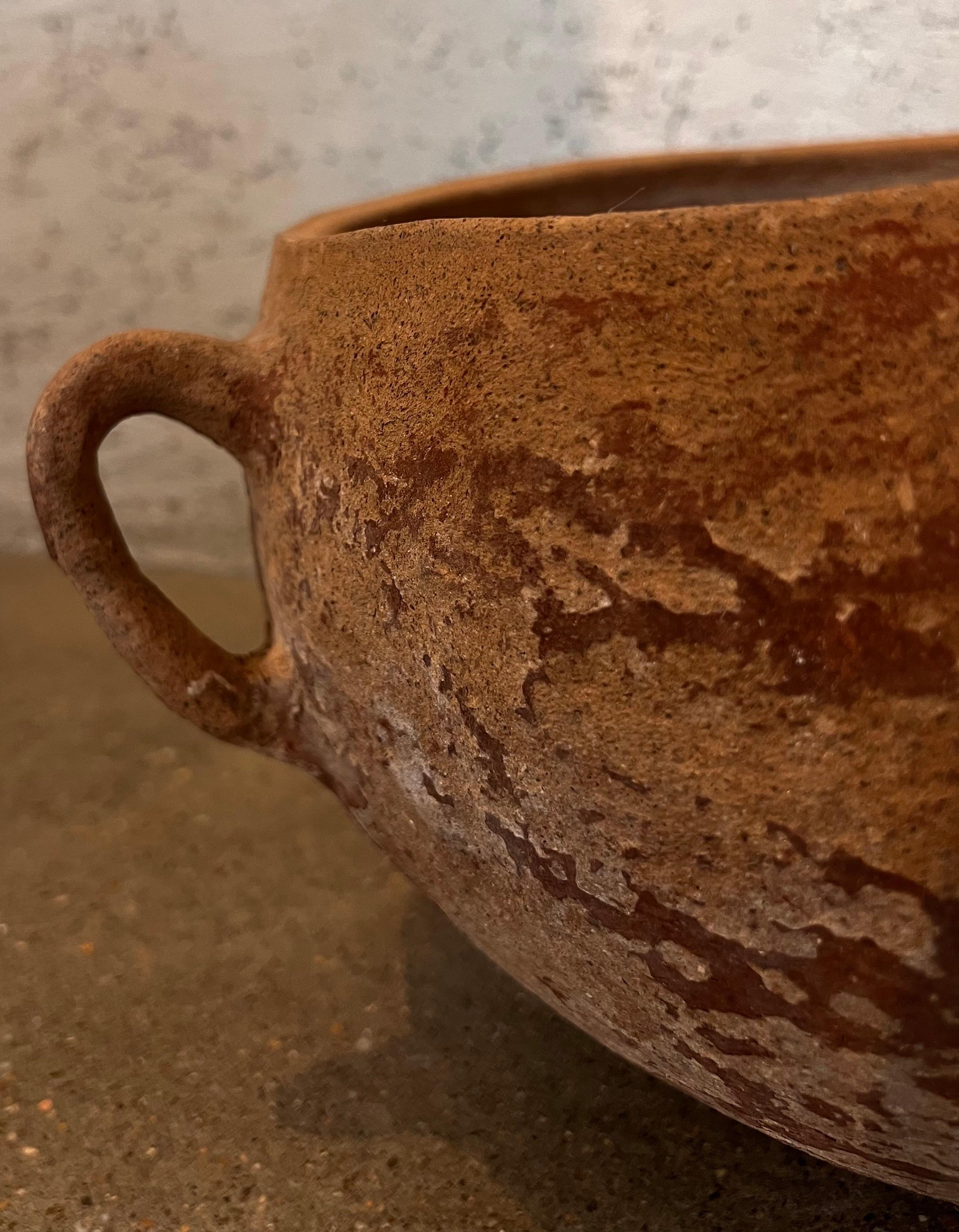 Found in the Yucatan this gorgeous vessel with beautiful patina is structurally sound and makes a wonderful statement piece.