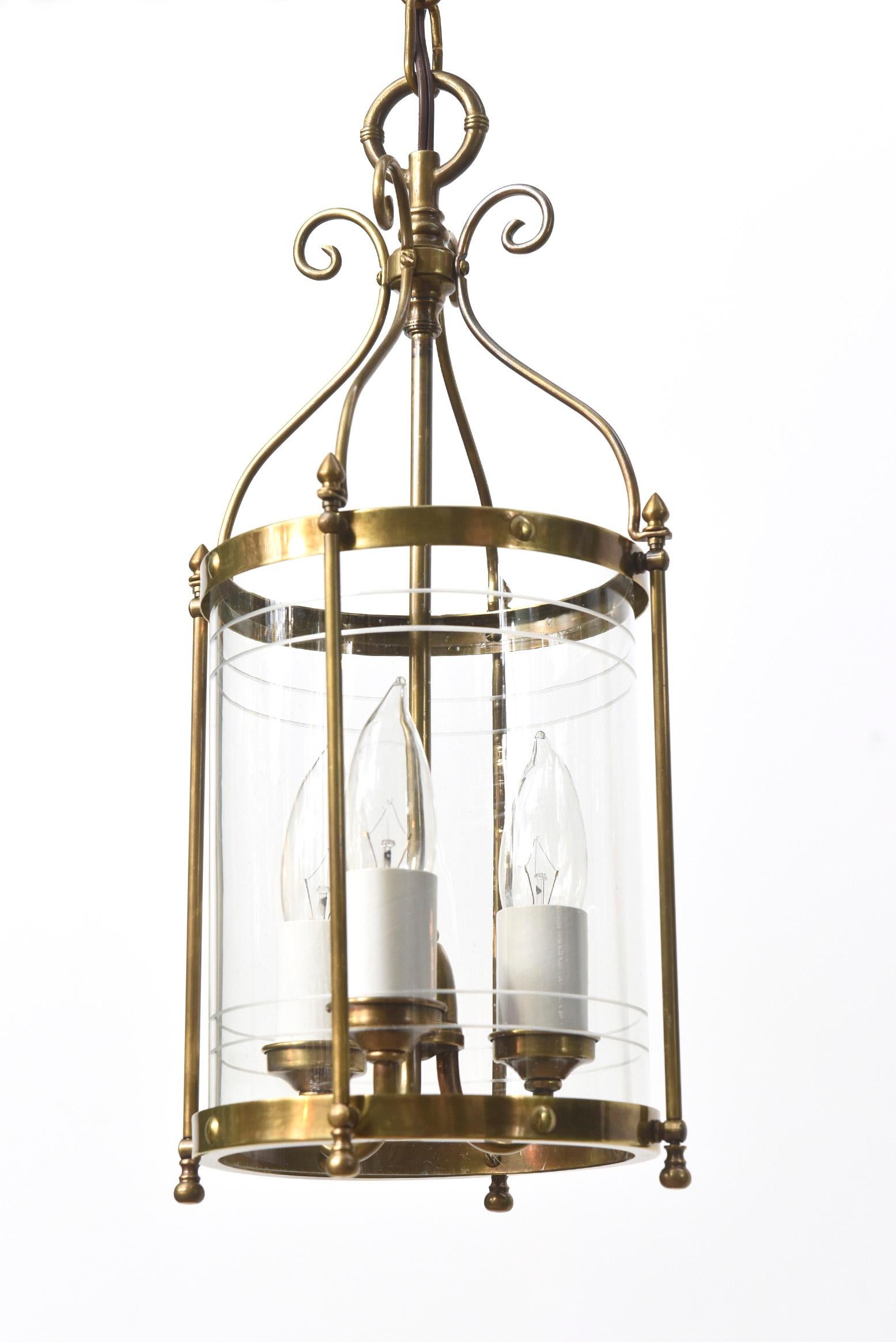 Small brass and Glass lantern with etched glass cylinder and three light cluster. Early 20th Century, Eastern European. Completely restored with a light antique brass finish, rewired and ready to hang.

Dimensions: 
Height: 20
Width (Diameter): 7.