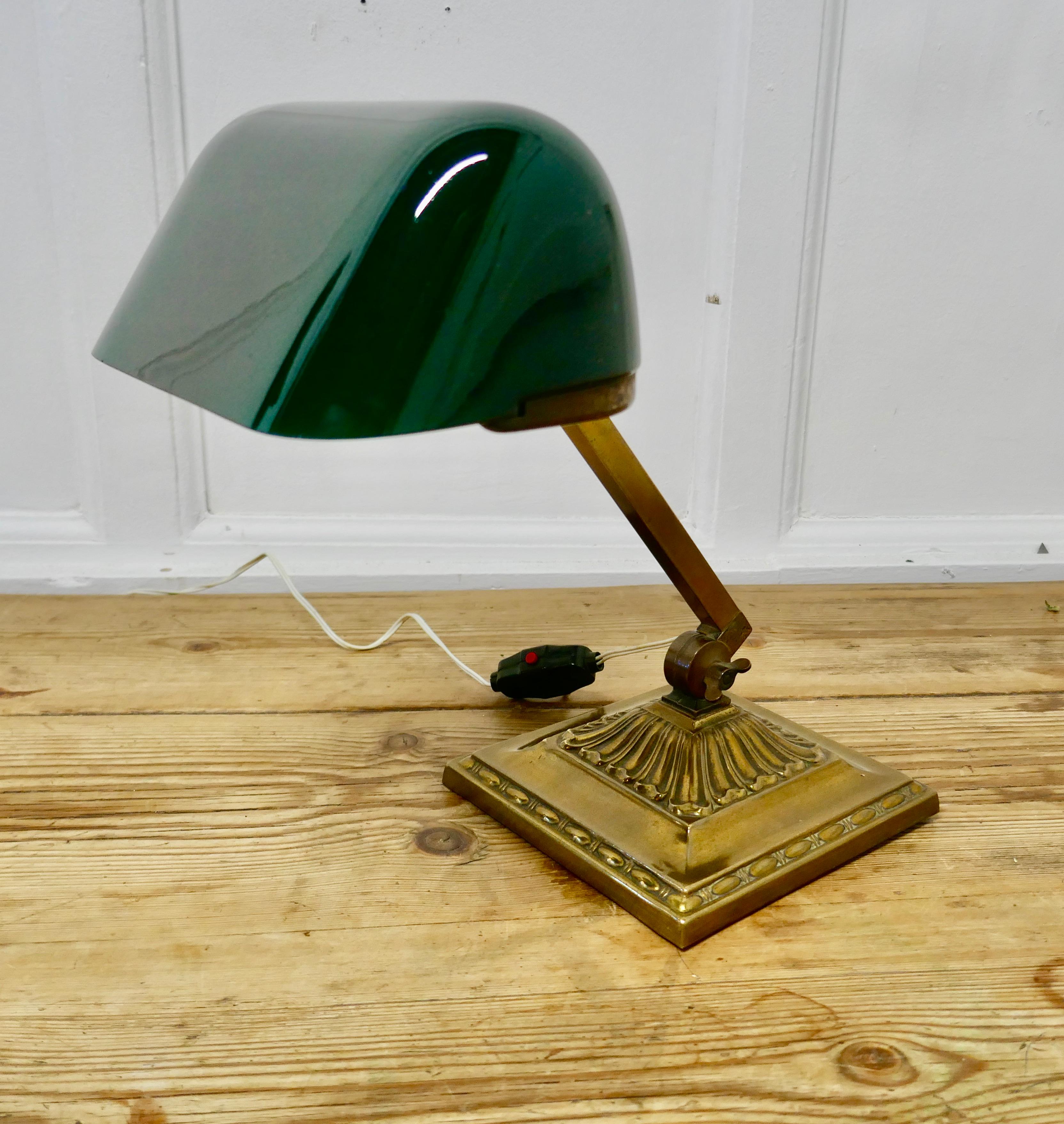Early 20th century brass and green glass barrister’s desk lamp

A beautiful and seldom seen heavy quality fully adjustable early vintage barrister’s brass desk lamp, with its original green glass lampshade with has a white reflective underside and