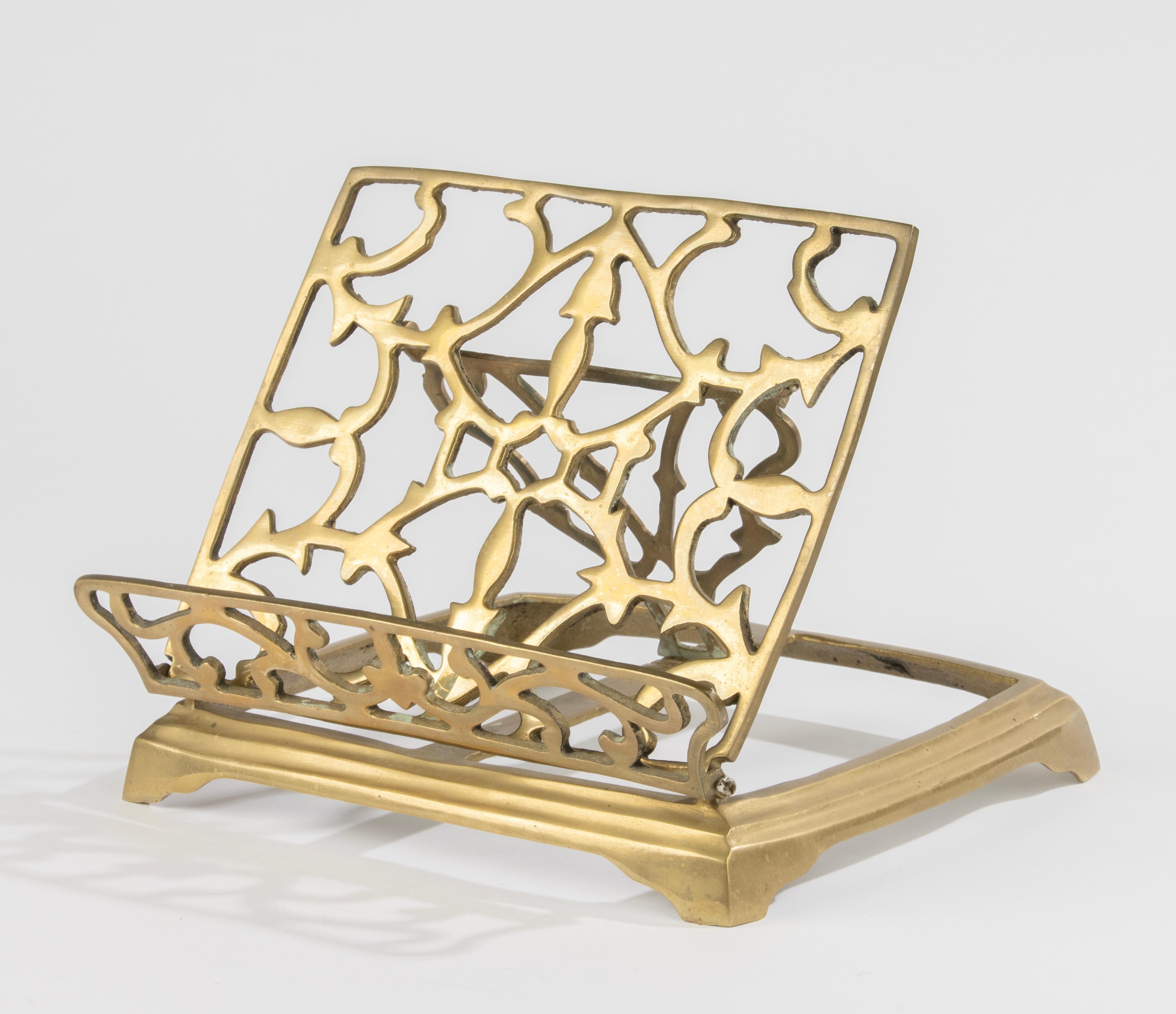 A beautiful antique brass book stand. Adjustable angle.  
Estimated date and origin: France, circa 1910. 
Dimensions: 24 x 21 cm and 19 cm tall. 
The book stand is in good condition. 
Free shipping worldwide. 