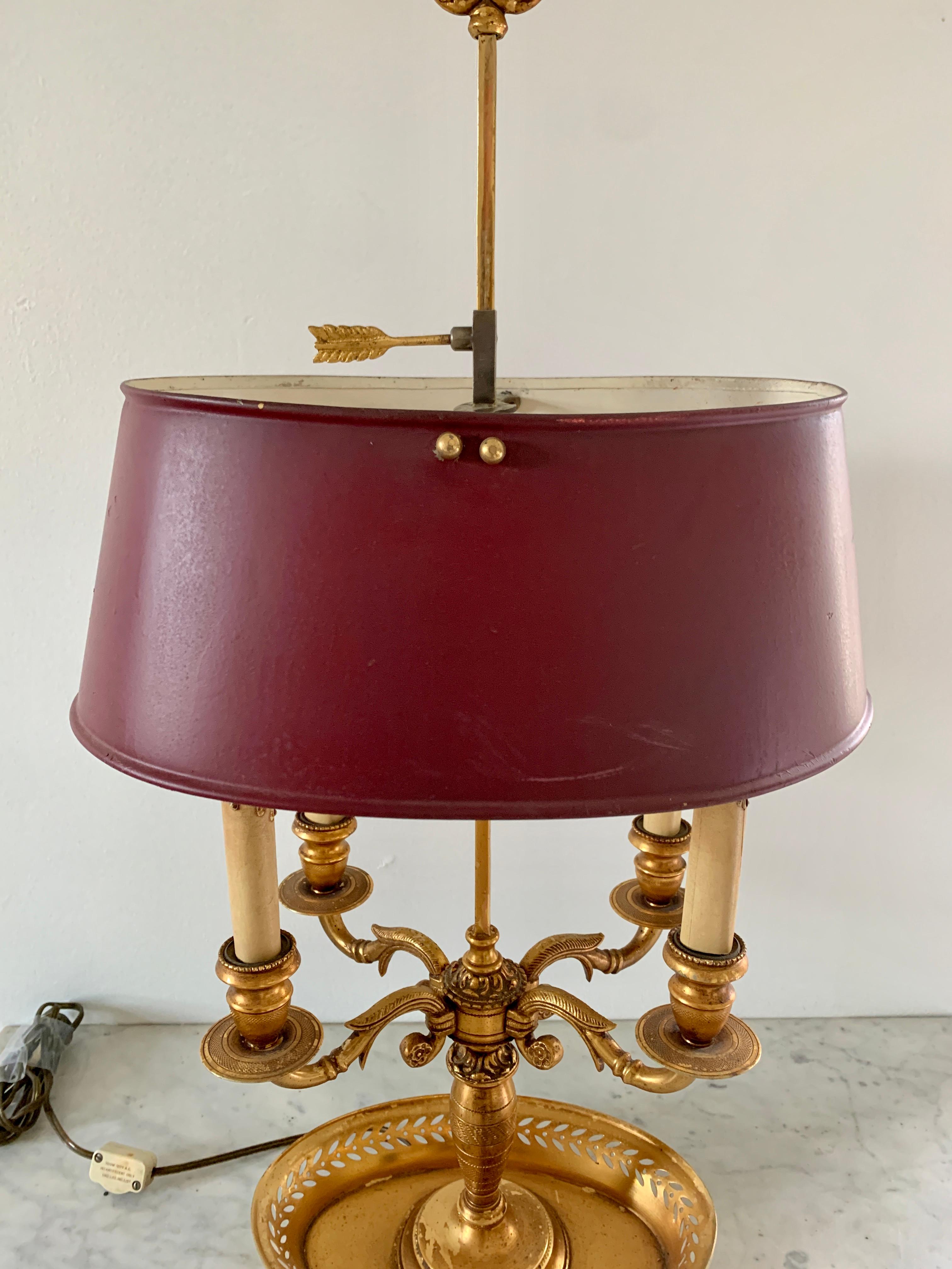 French Provincial Early 20th Century Brass Four Arm Bouillotte Lamp with Burgundy Tole Shade For Sale