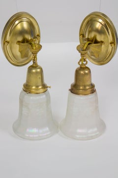 Early 20th Century Brass Sconces With Spiderweb arms and Iridescent Glass Shades