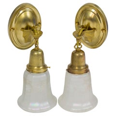 Early 20th Century Brass Sconces With Spiderweb arms and Iridescent Glass Shades