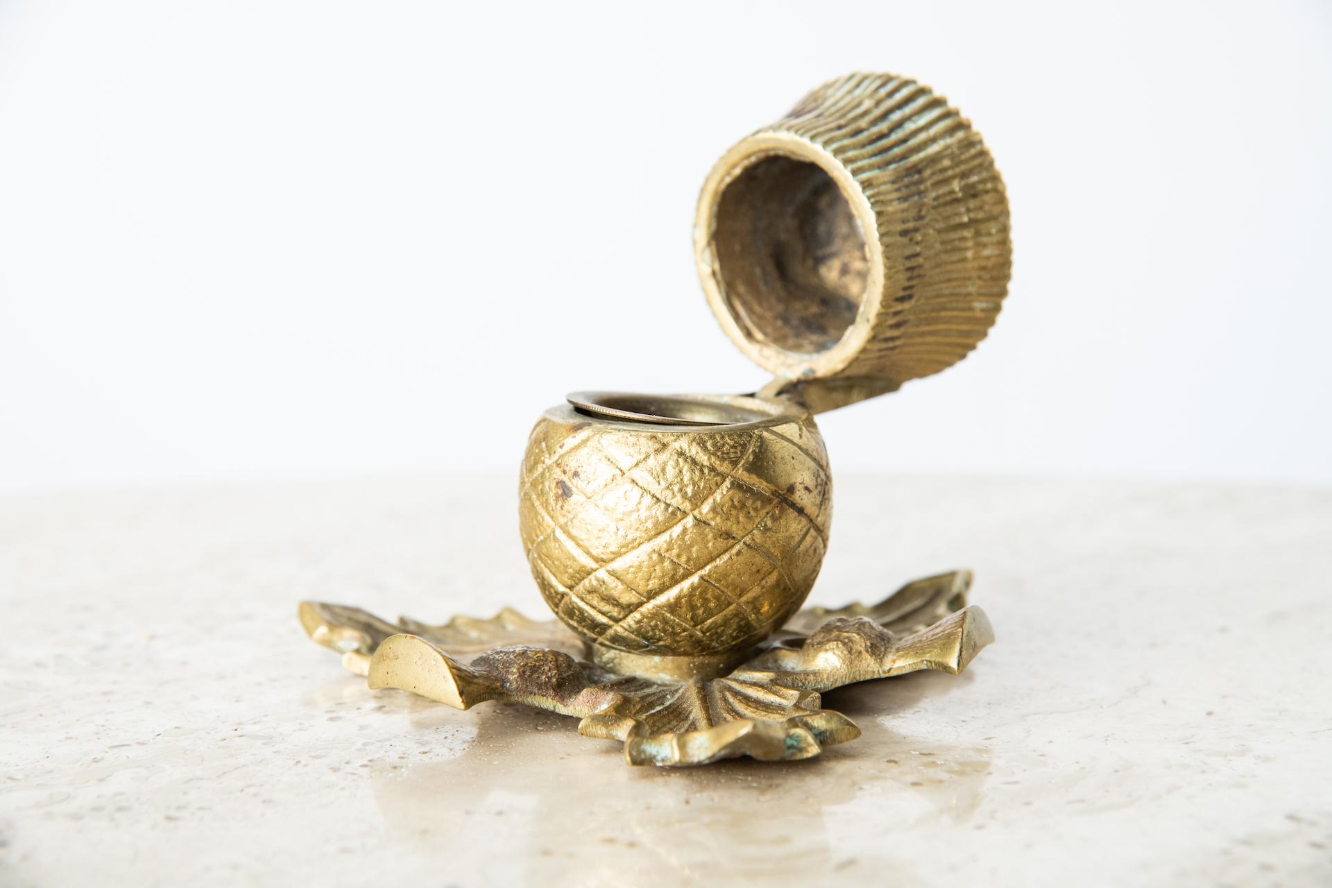 Cast brass inkwell with removable well in the form of a Scottish thistle.