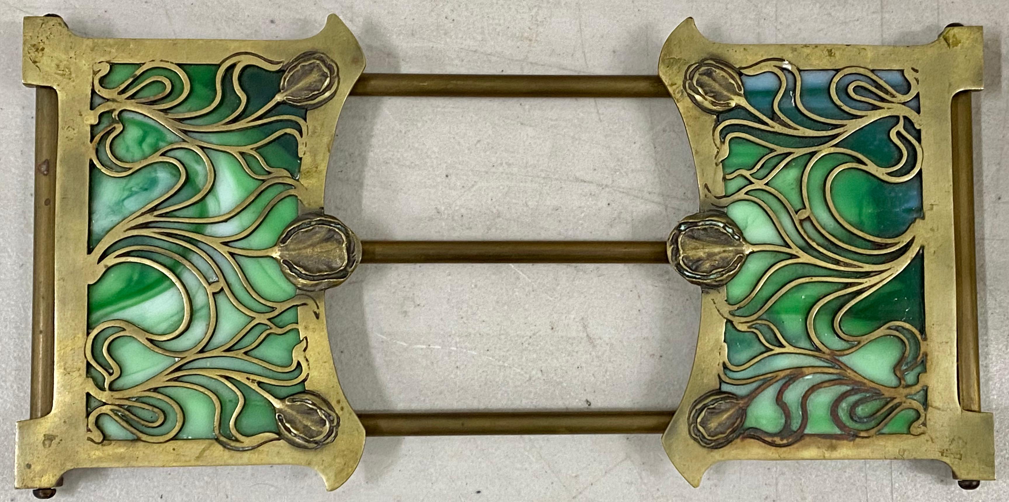 Early 20th century brass & stained glass folding / expanding book holder C.1910

Beautiful Art Nouveau expanding book holder

Measures: 13