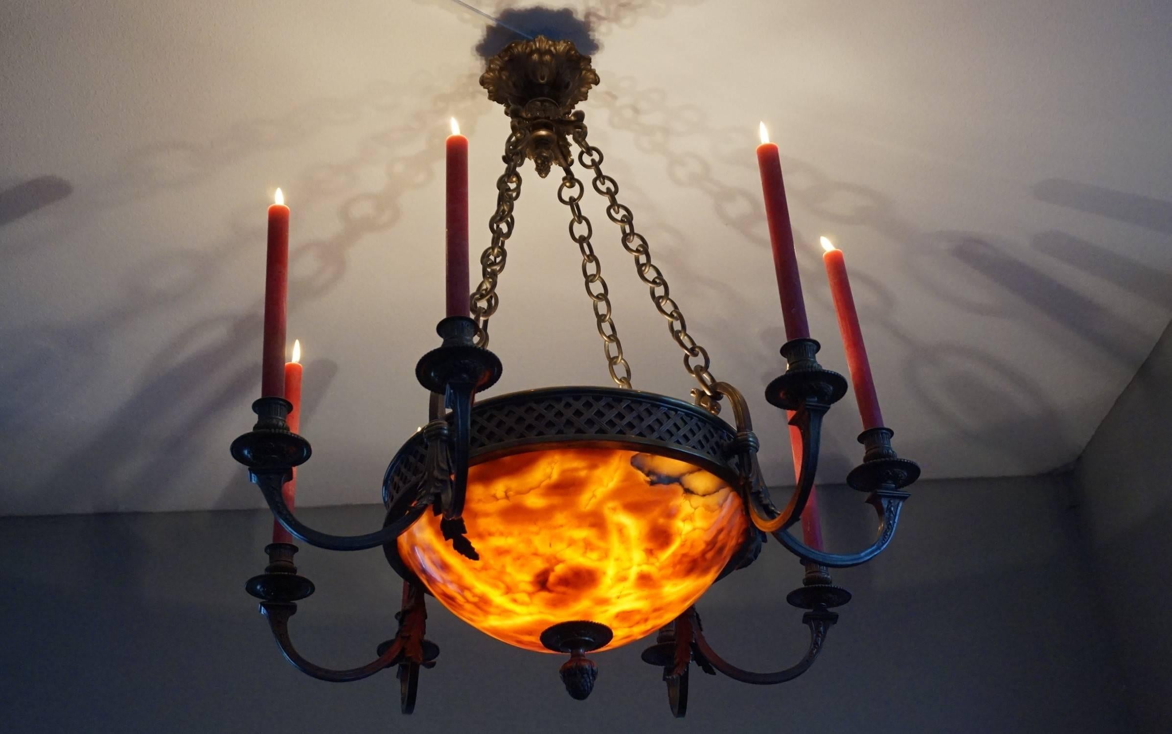 Early 1900s, European top quality workmanship chandelier.

This impressive and all handcrafted chandelier from early 20th century Europe has the most wonderful look and feel. This sizable and quality made light fixture can single- handedly turn any