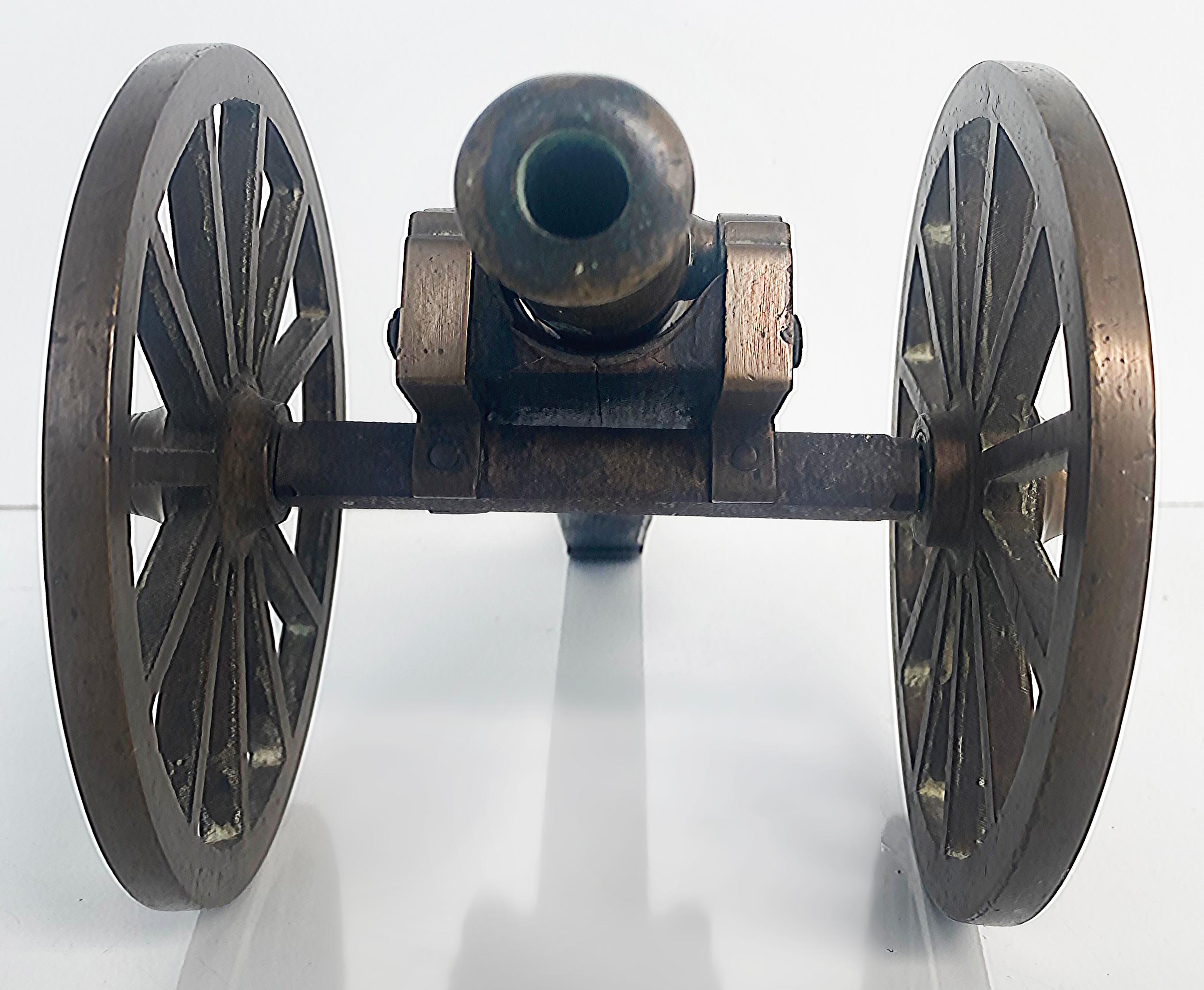Early 20th Century Bronze and Wood Mounted Cannon Model with Large Wheels In Good Condition For Sale In Miami, FL