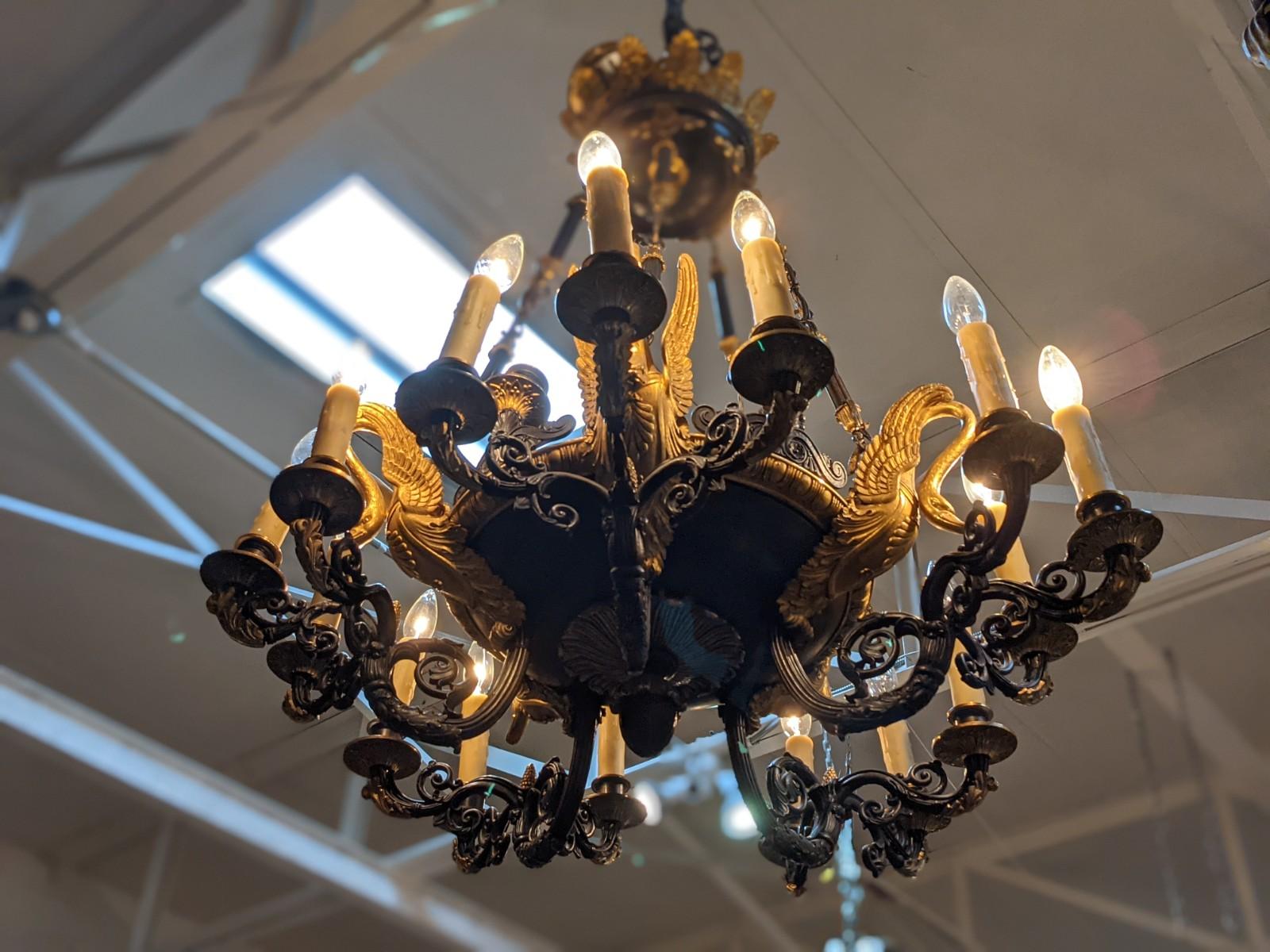 This Empire style bronze chandelier origins from France, circa 1920.



 