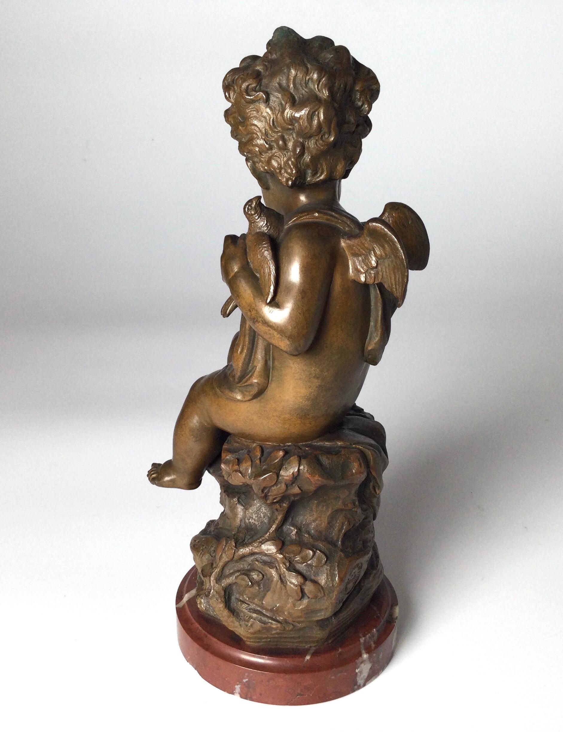 Europeo Figura di cherubino in bronzo dei primi del Novecento su base di marmo in vendita