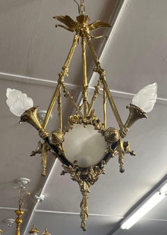 Early 20th Century Bronze French Style 4 Light Chandelier With Shades