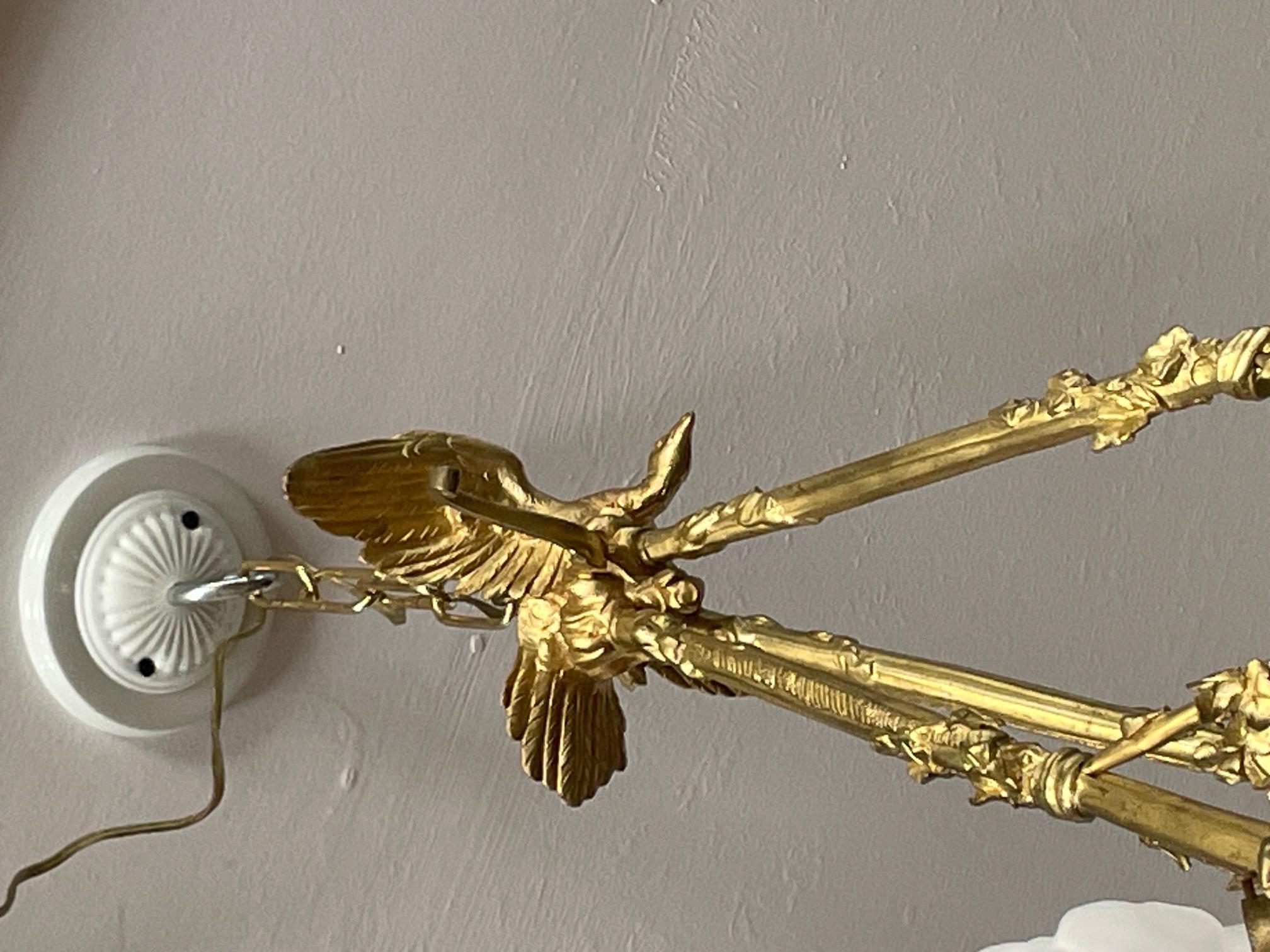 Bronzo Lampadario a 4 luci in stile francese in bronzo dei primi del '900 con paralumi in vendita
