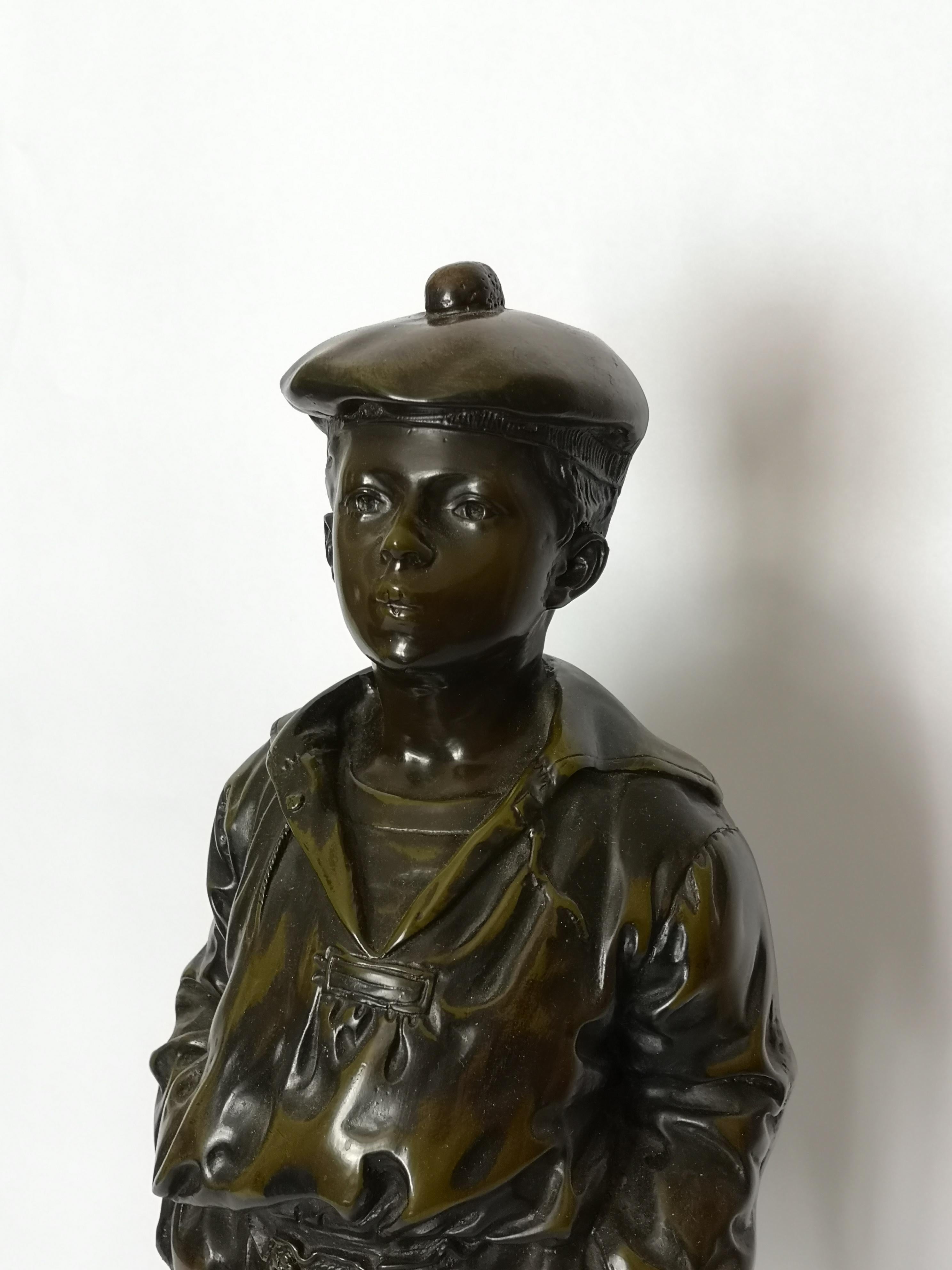 An early 20th century bronze sculpture of a whistling boy. He is stood barefoot, hands in pockets with a whistling expression on his face and wearing a cap. Rubbed to the base but signed V. Szczeblewski,
circa 1910.