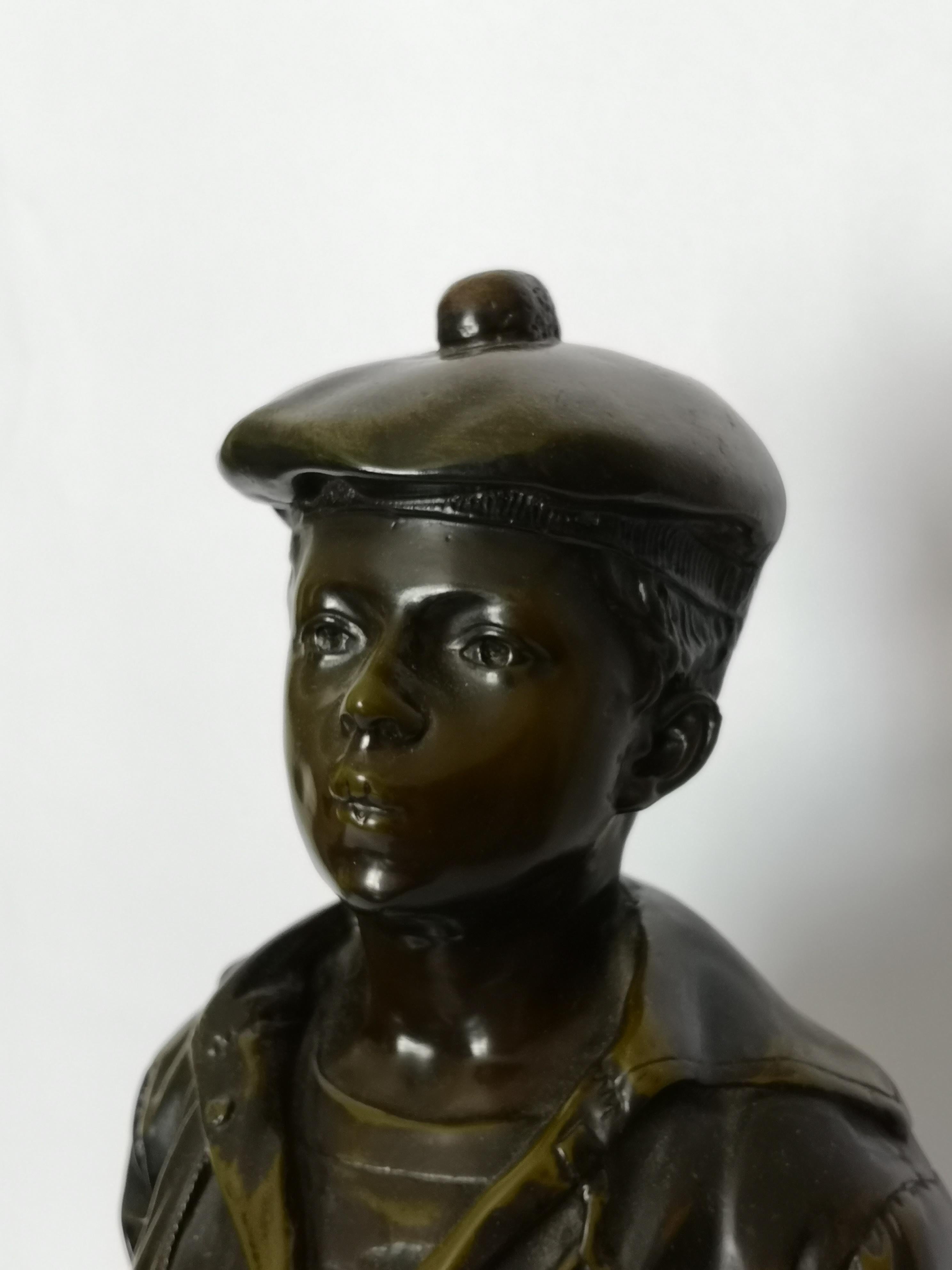whistling boy statue for sale