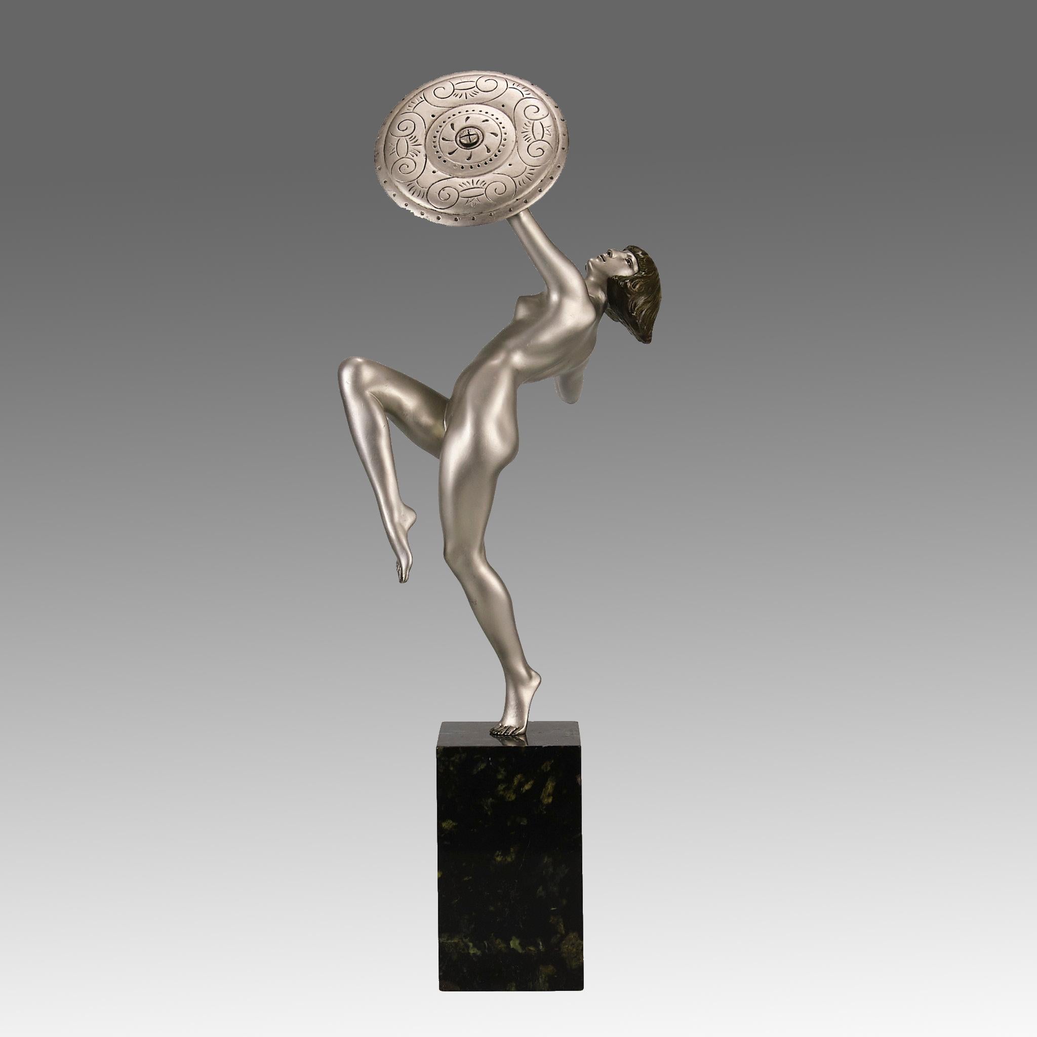 An iconic Art Deco cold painted bronze sculpture of a female warrior holding a shield and sword in an energetic pose, exhibiting fine colour and detail, raised on a black marble base and signed Le Faguays

ADDITIONAL INFORMATION
Height:             