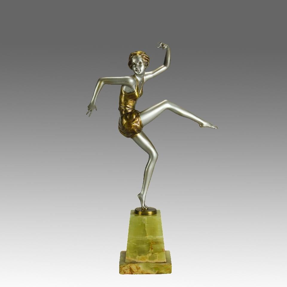 An attractive early 20th Century Art Deco cold painted bronze figure of a young energetic beauty in a dancing pose, exhibiting excellent colour and very fine hand chased surface detail. Raised on an onyx base and signed Lorenzl
ADDITIONAL