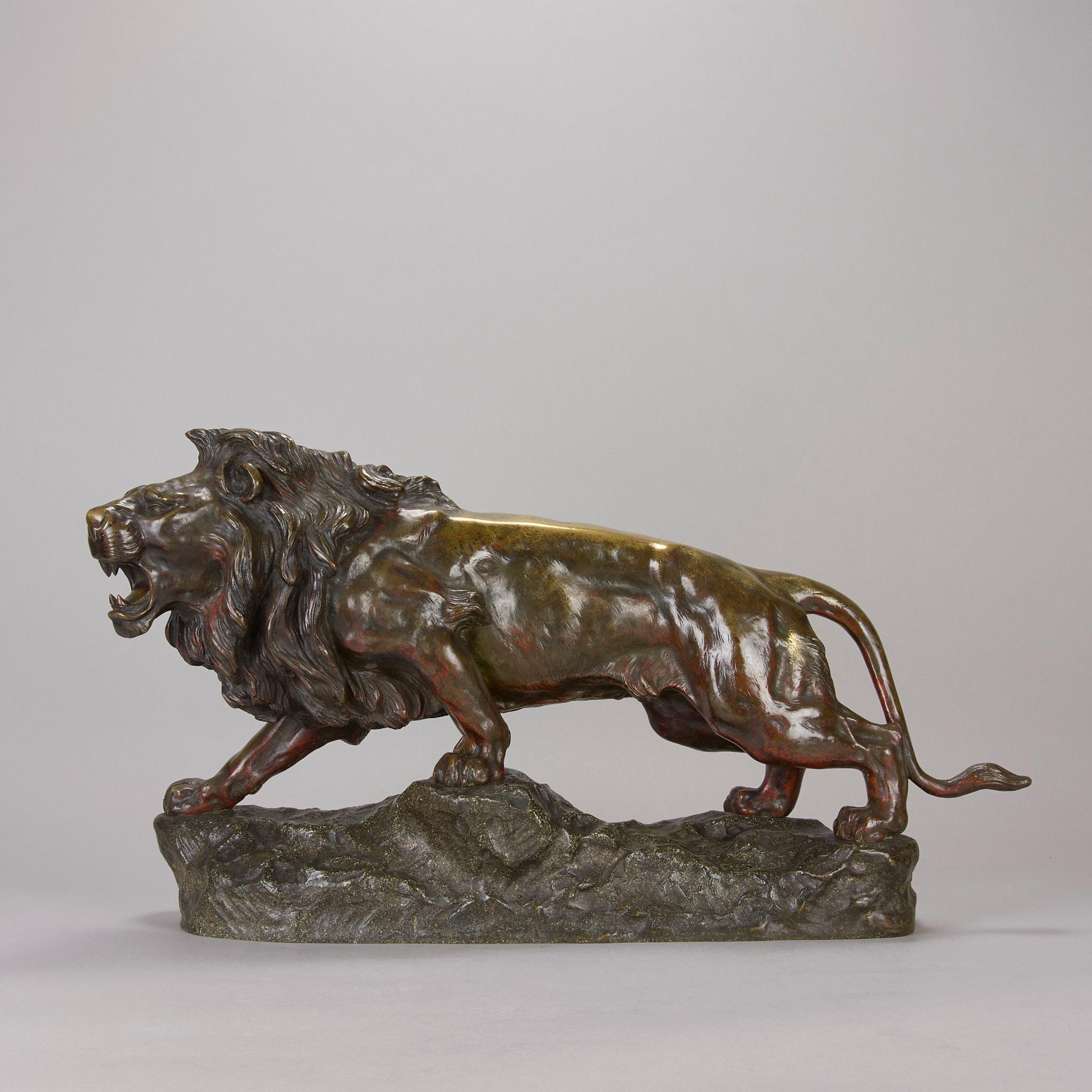 A large and impressive early 20th Century bronze study of a walking lion with fine deep brown, gold and orange patination and good surface detail. Raised on naturalistic bronze base, signed Joe Descomps 

Additional Information

Height: 30