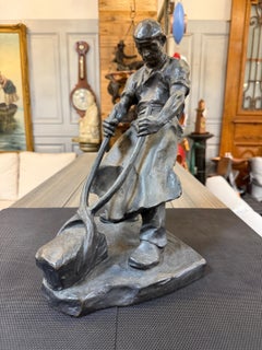 Early 20th Century Bronze Sculpture, "Smithy Working with Large Tongs" by Müller
