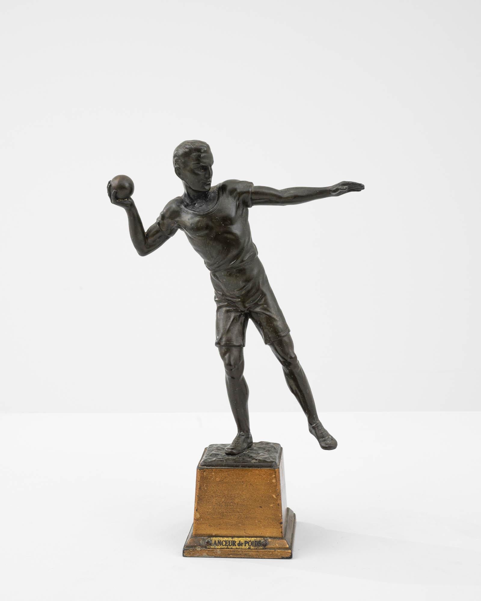 Sport has pervaded art as a motif, and sculpture specifically, since ancient times. This take on the classical motif renders a distinctly 20th century French version. Cast in bronze, an olympian figure tilts sharply to one side, capturing the moment