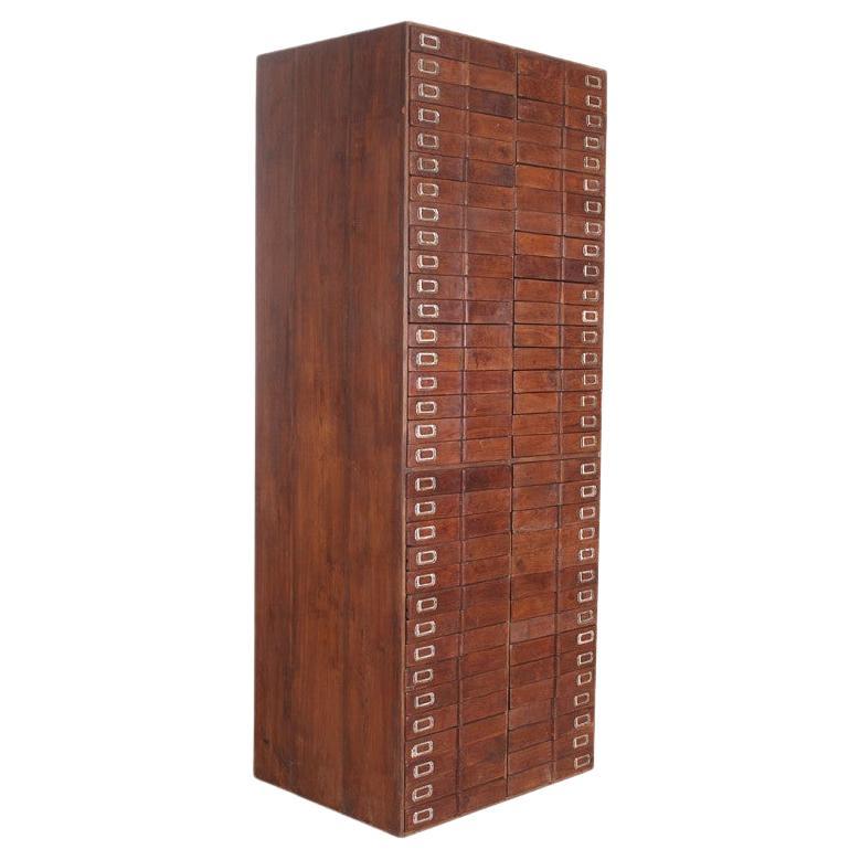 Early 20th Century Brutalist Teak Cabinet of 66 Drawers, India For Sale