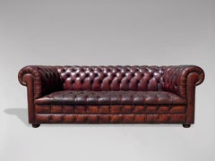 Early 20th Century Burgundy Colour Leather Three Seater Chesterfield