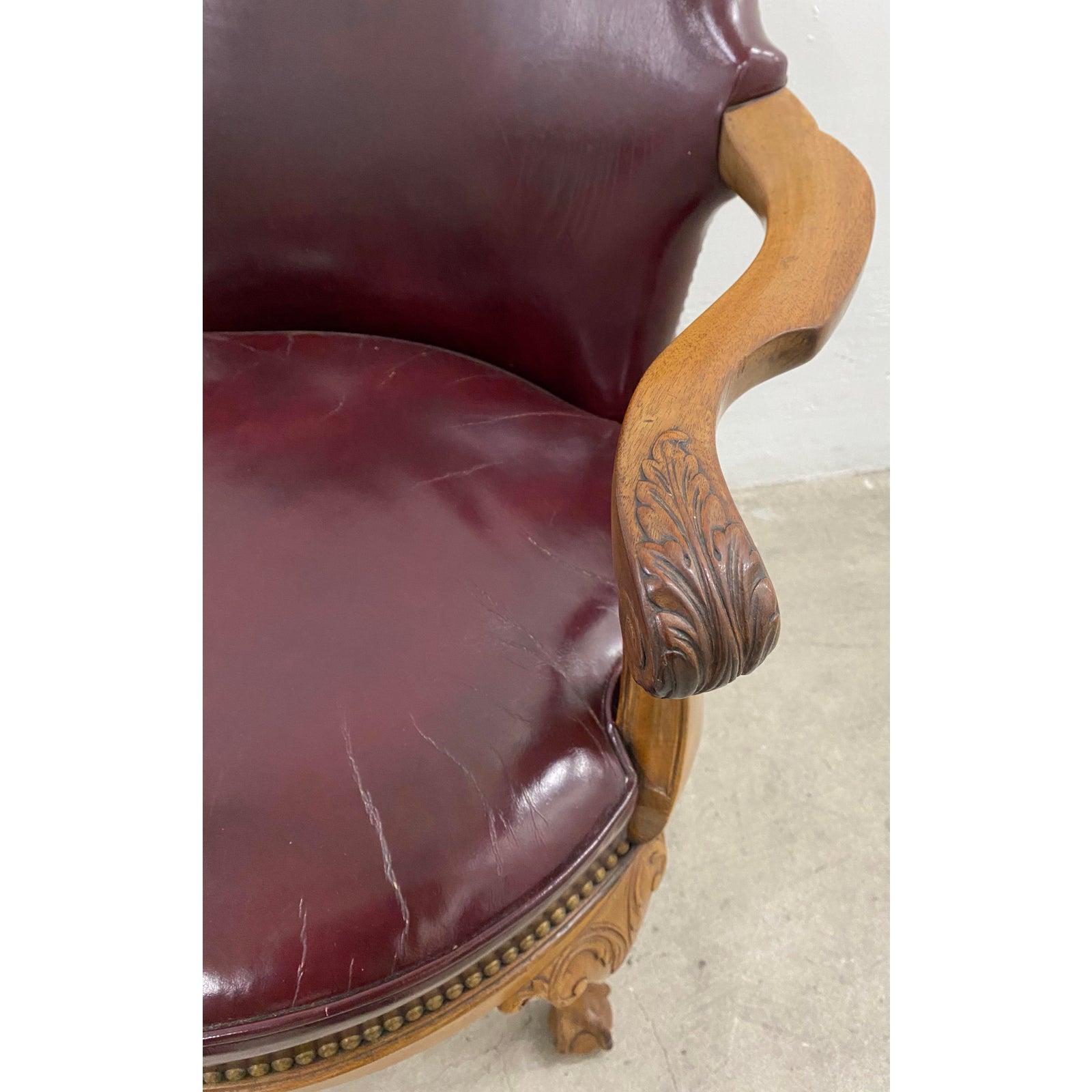 Chippendale Early 20th Century Burgundy Leather and Carved Oak Swivel Chair, circa 1920 For Sale