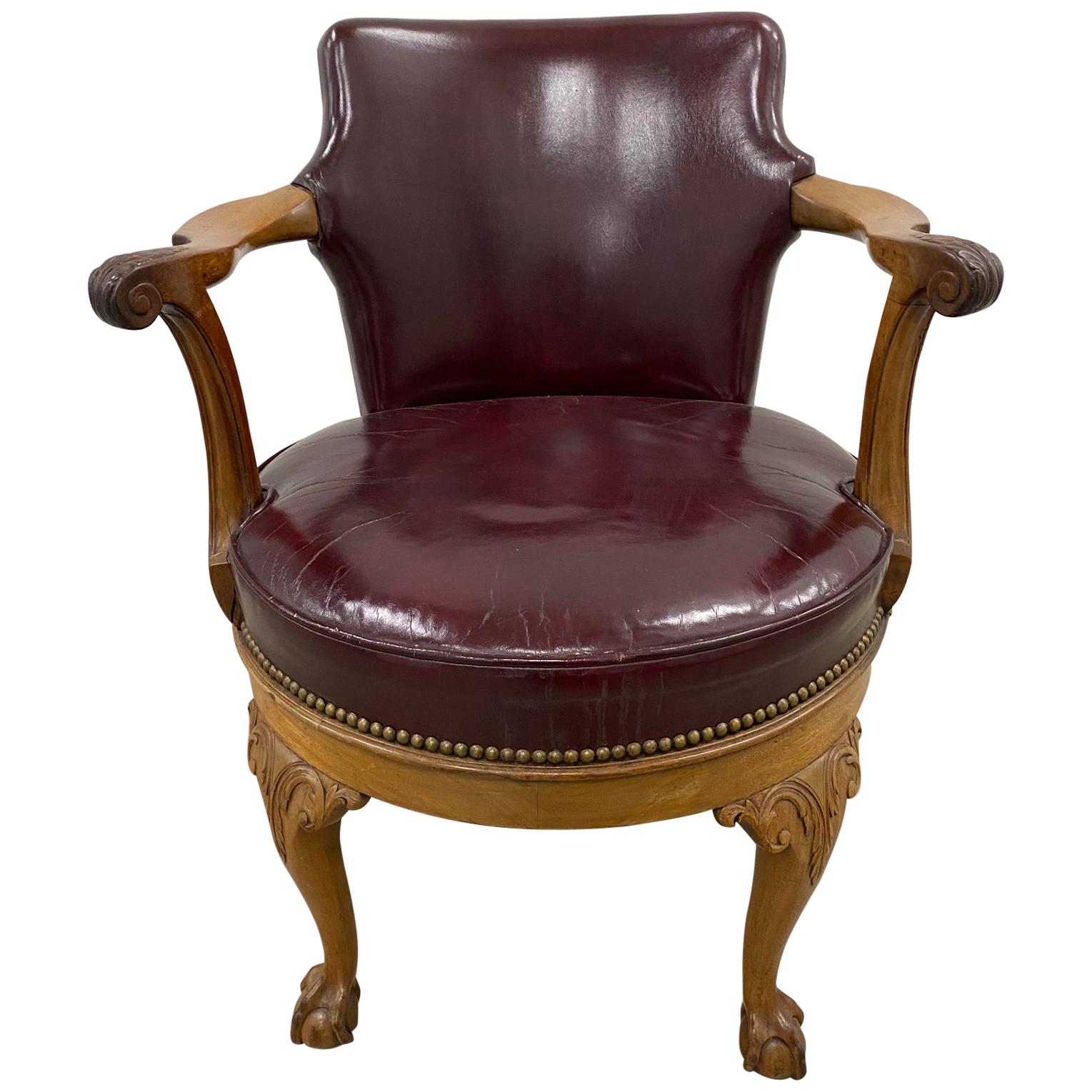 Early 20th Century Burgundy Leather and Carved Oak Swivel Chair, circa 1920 For Sale