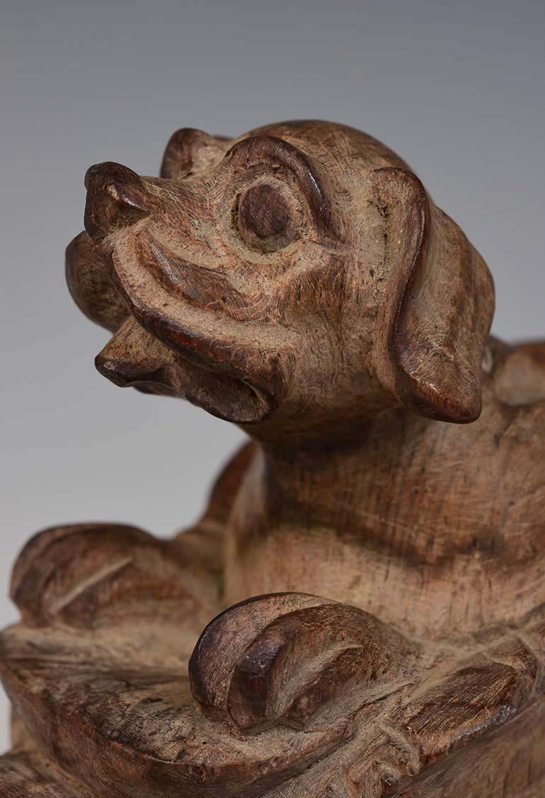 Burmese wooden dog.

Age: Burma, Early 20th Century
Size: Height 13.4 C.M. / Width 7.8 C.M. / Length 13 C.M.
Condition: Nice condition overall (some expected degradation due to its age).