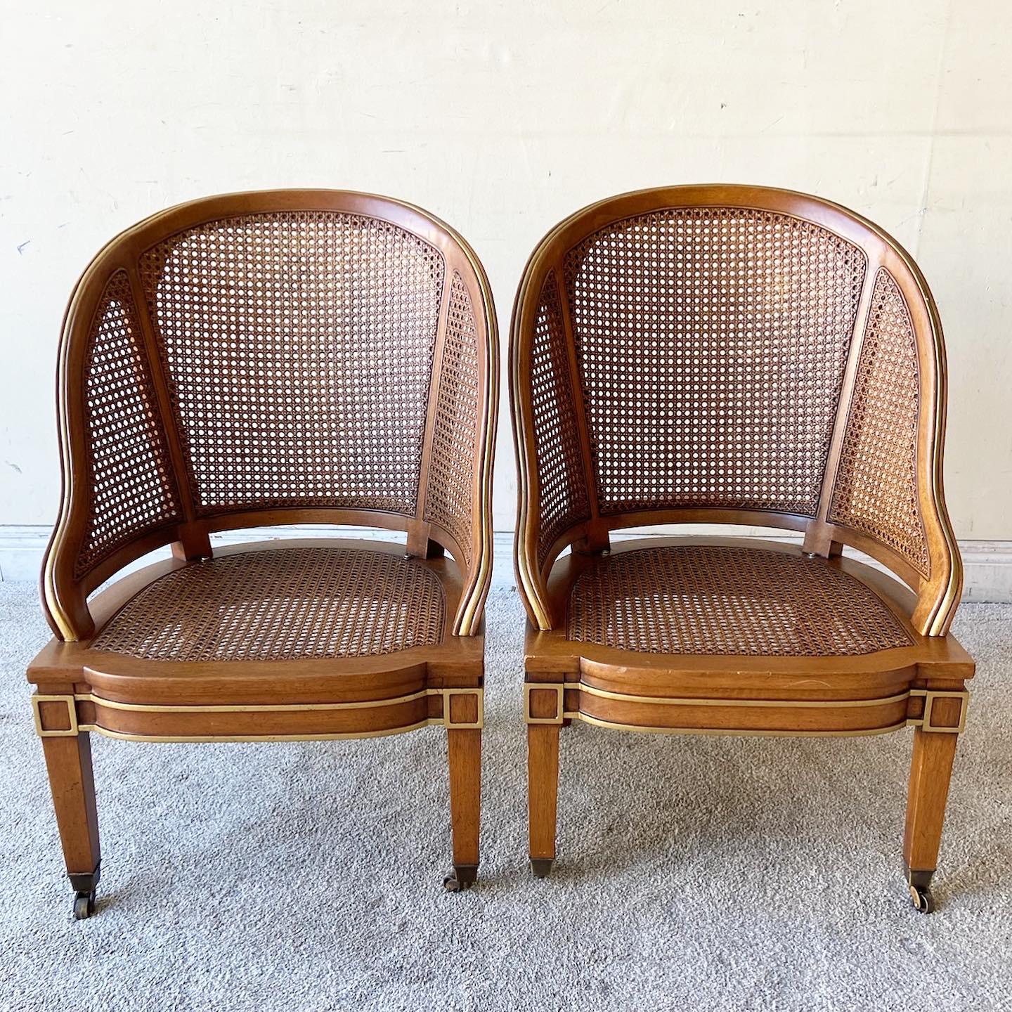 Exceptional pair of early 20th century club chairs on casters. Each seat features came through out the sides and seats.
 