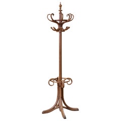 Appendiabiti "Perroquet" in bengala intagliato dei primi del Novecento, stile Thonet