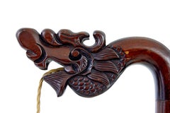 Early 20th century carved Chinese hard wood floor lamp