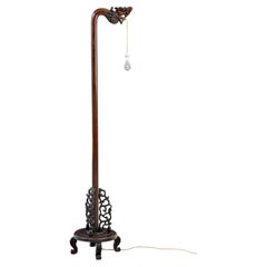 Used Early 20th century carved Chinese hard wood floor lamp