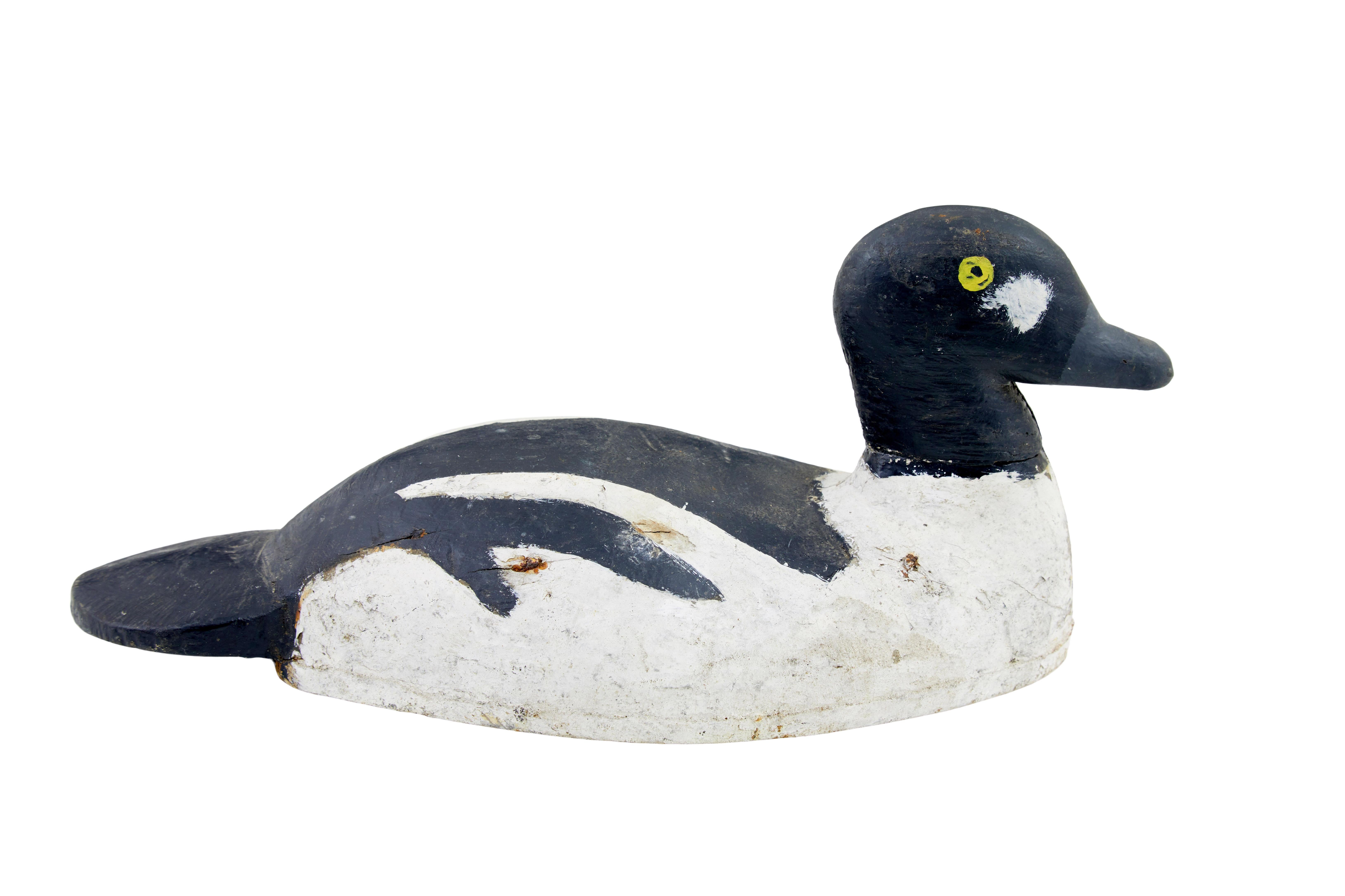 Appelant du début du 20e siècle, sculpté et peint à la main, circa 1920.

Appelant scandinave peint à la main, noir et blanc avec des yeux jaunes.   Un bel exemple de la manière dont les choses se faisaient autrefois, qui constitue aujourd'hui un