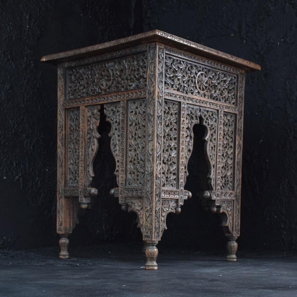 Early 20th Century Carved Indian Table  

Dated from the early 20th century this hand carved side table showcases a typical Rajasthani carved design. With wonderful, refined edge detail and archway central design. An aged example yet a very easy