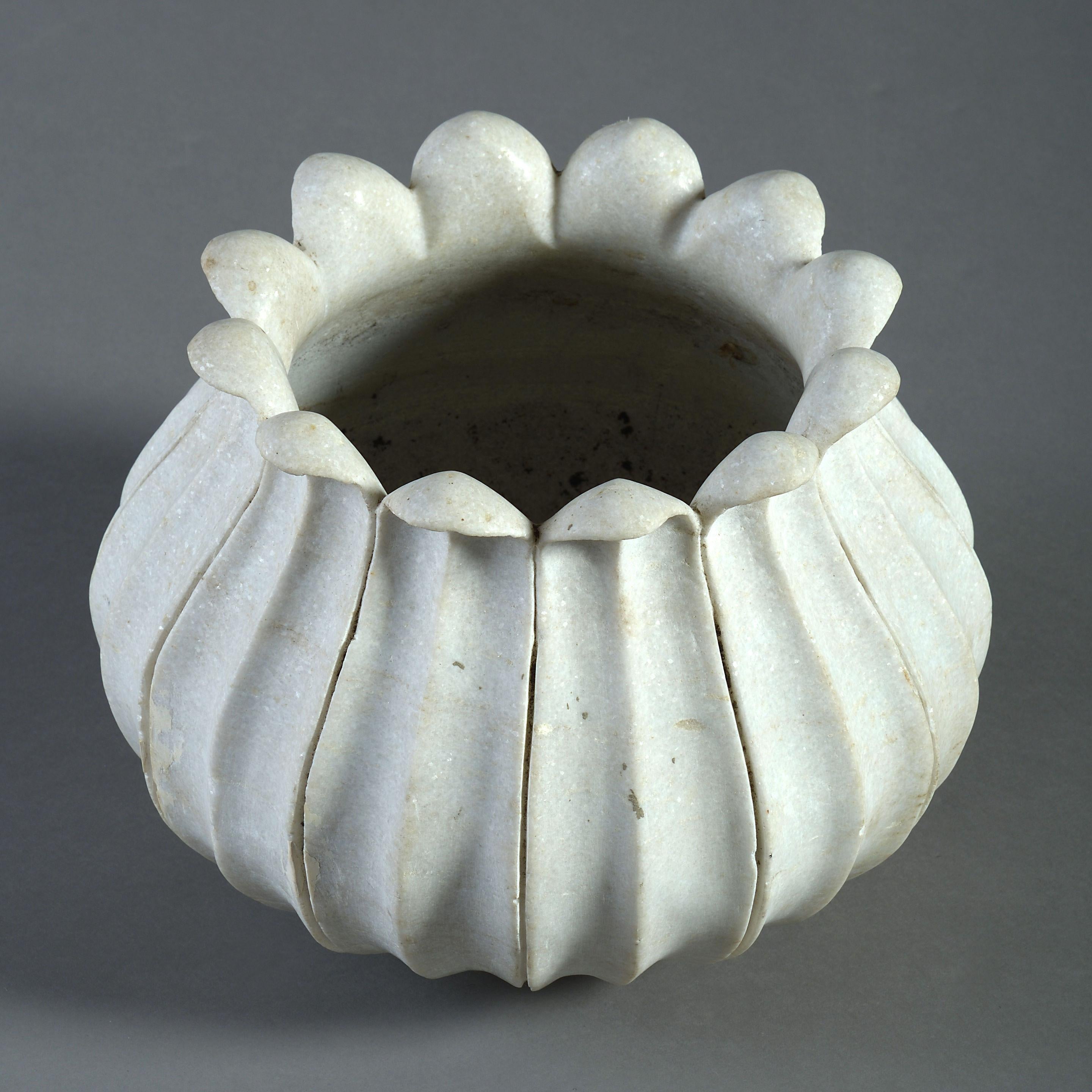 An early 20th century carved marble planter or jardiniere taking the form of a stylised lotus flower.