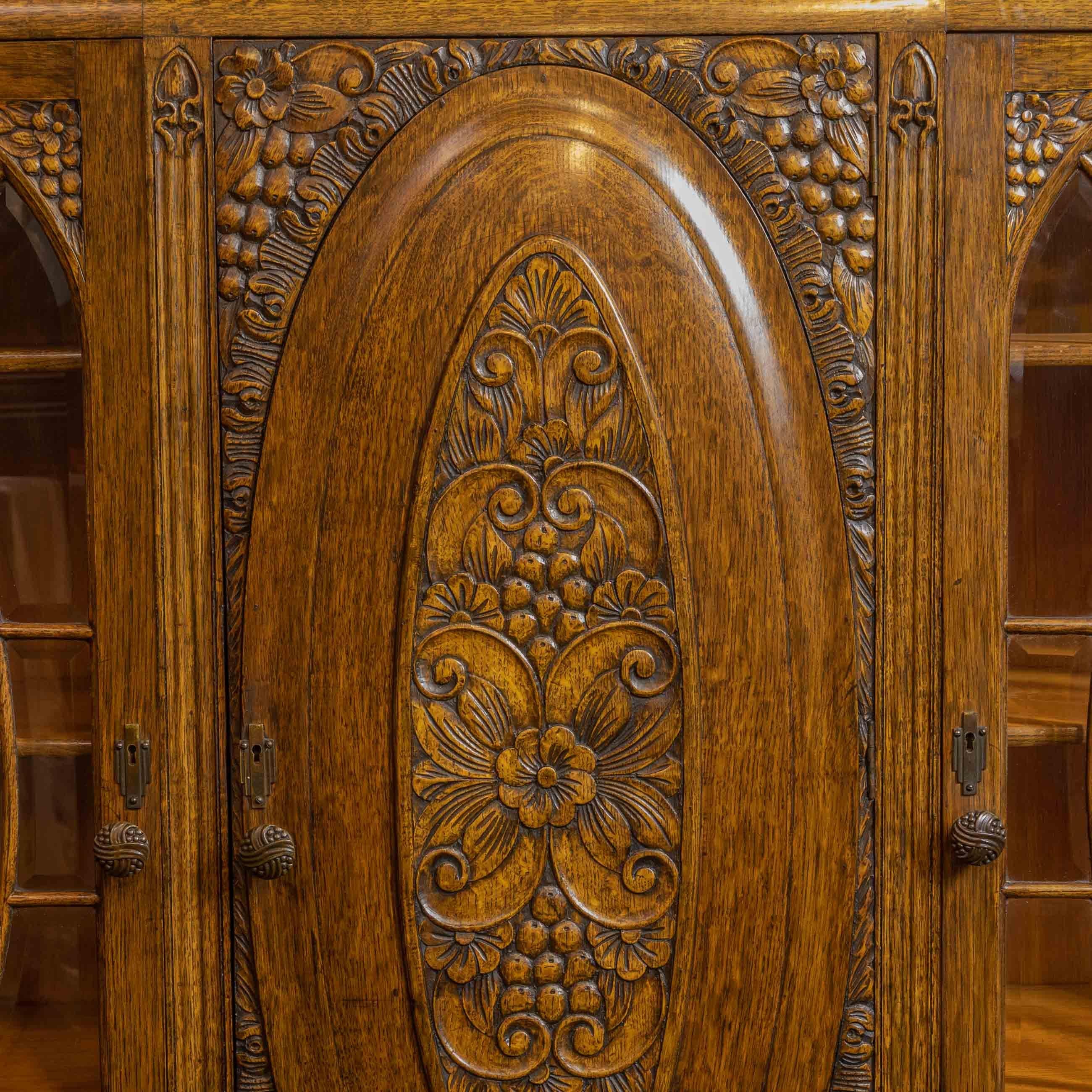 Early 20th Century Carved Oak Bookcase For Sale 8