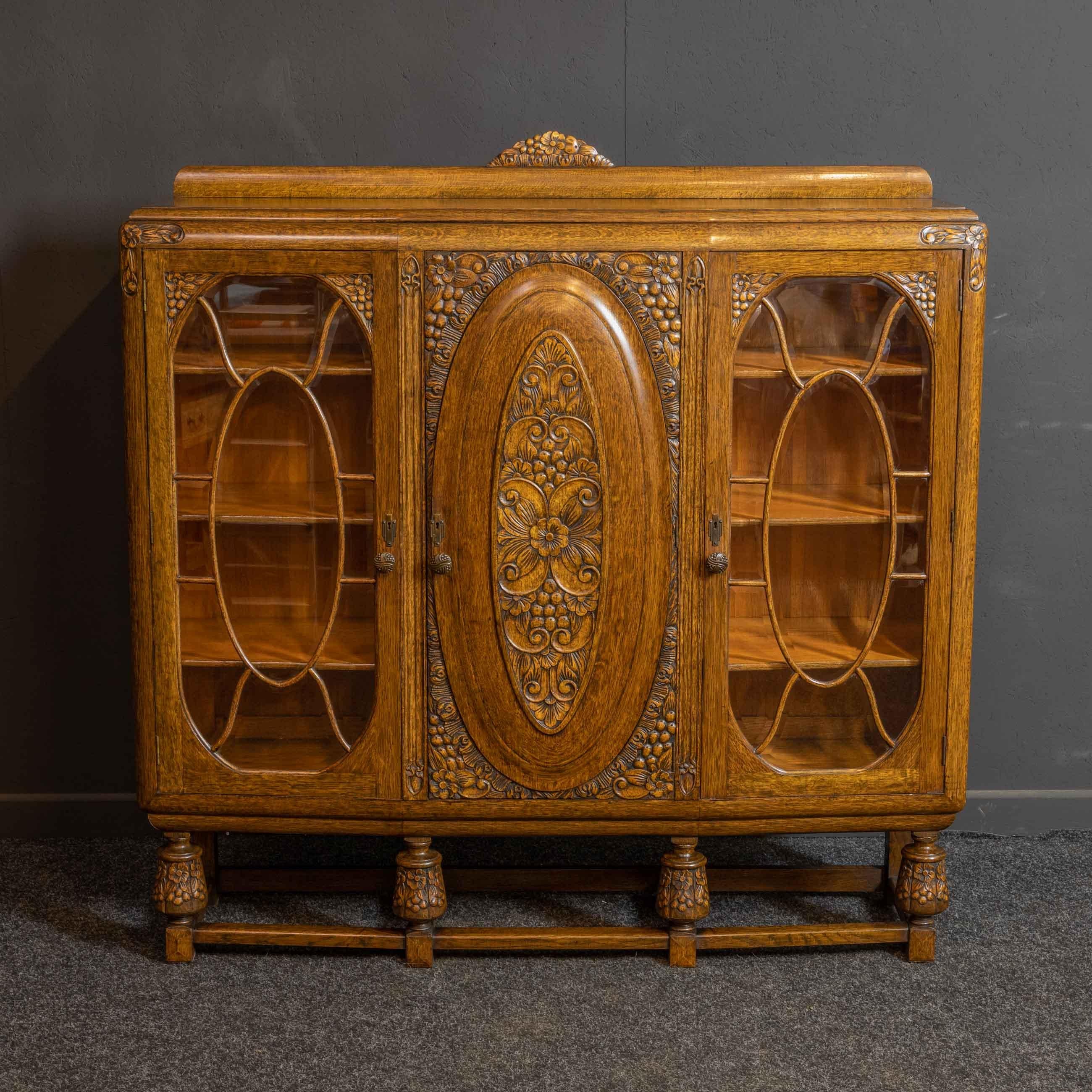 British Early 20th Century Carved Oak Bookcase For Sale