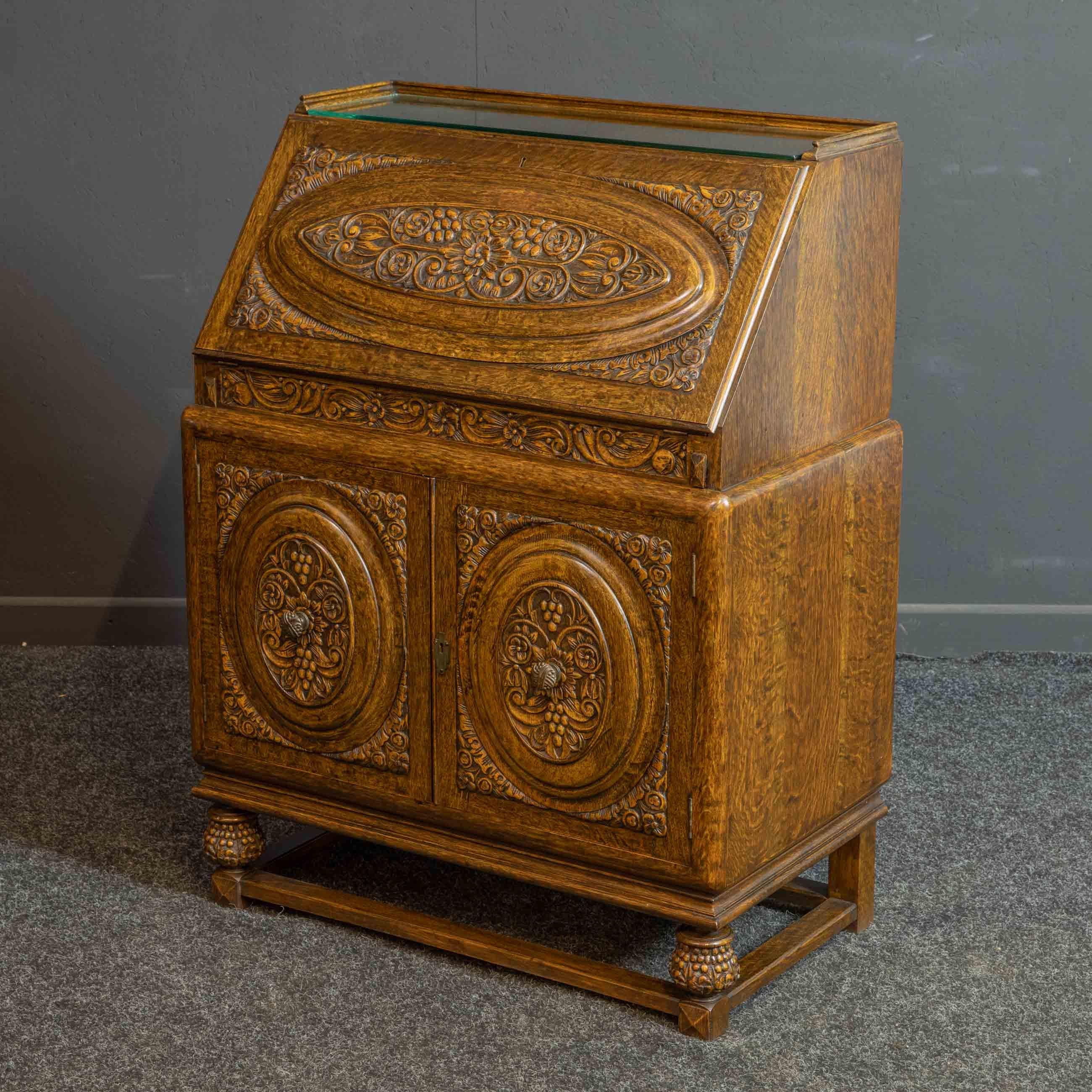 British Early 20th Century Carved Oak Bureau For Sale