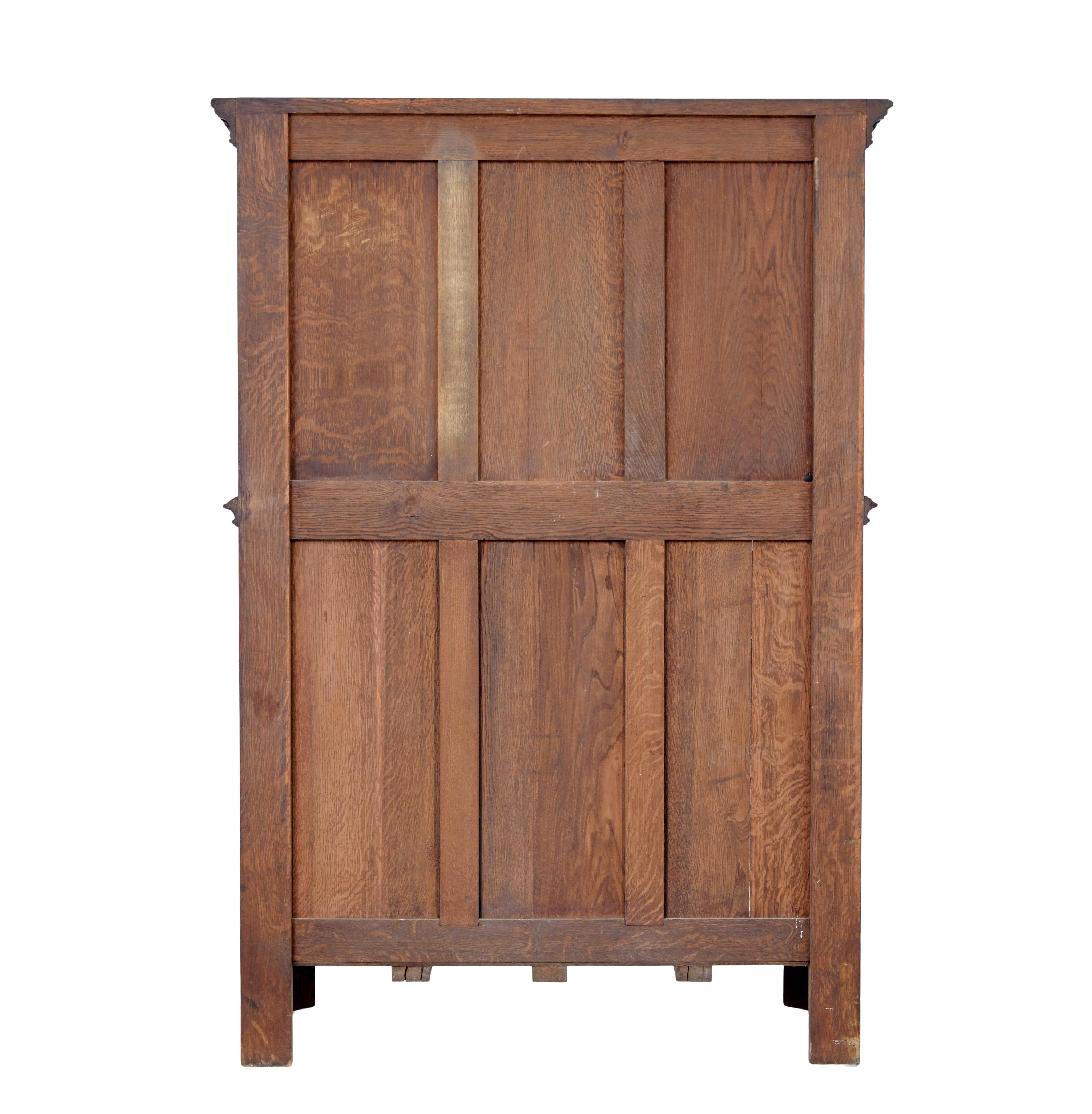 Hand-Carved Early 20th century carved oak renaissance revival cupboard For Sale