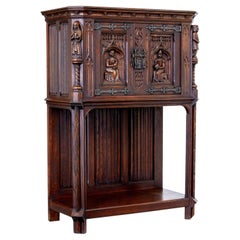 Early 20th century carved oak renaissance revival cupboard